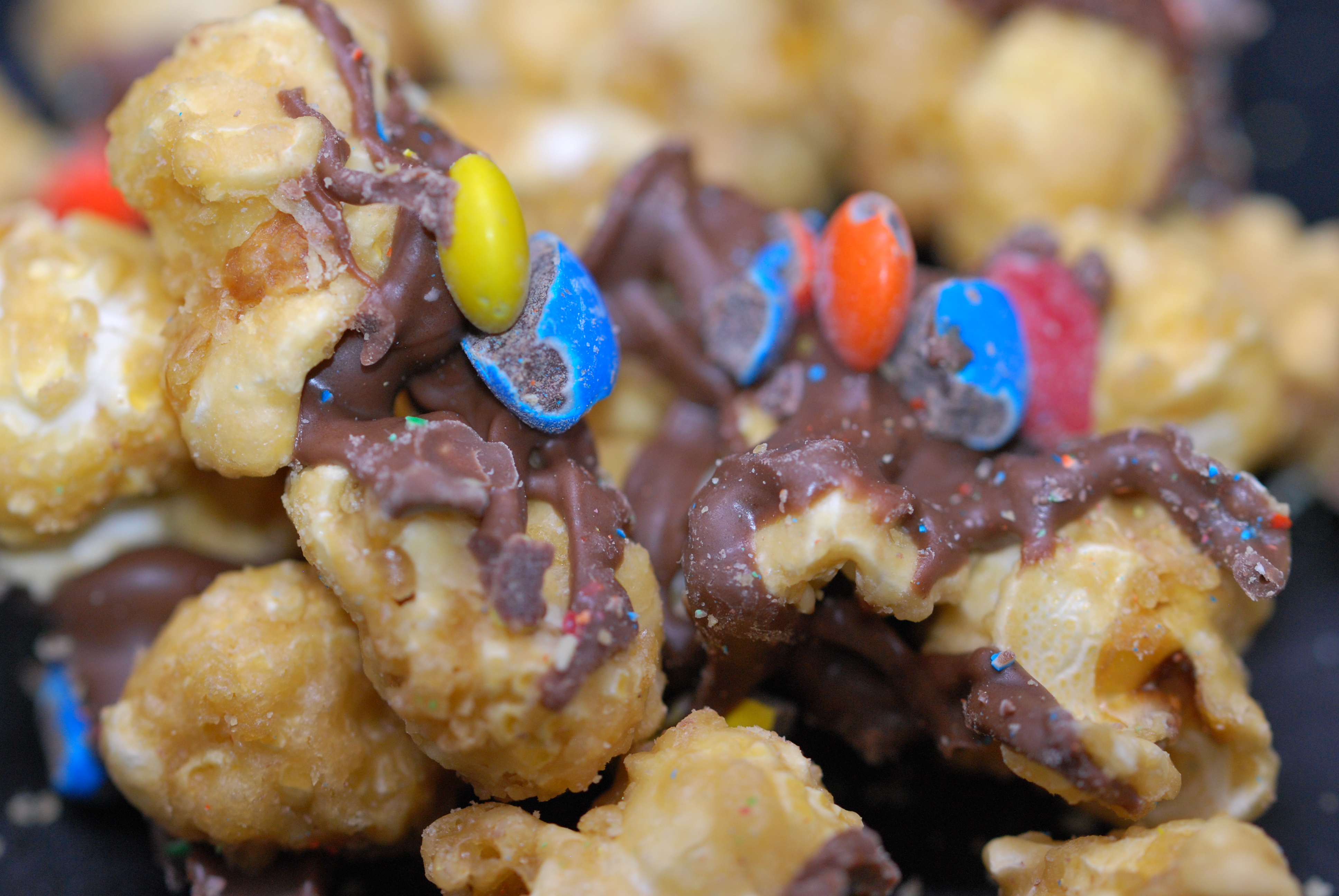 Order M & M Milk Chocolate Caramel Corn food online from Kernels By Chrissie store, Cleveland on bringmethat.com