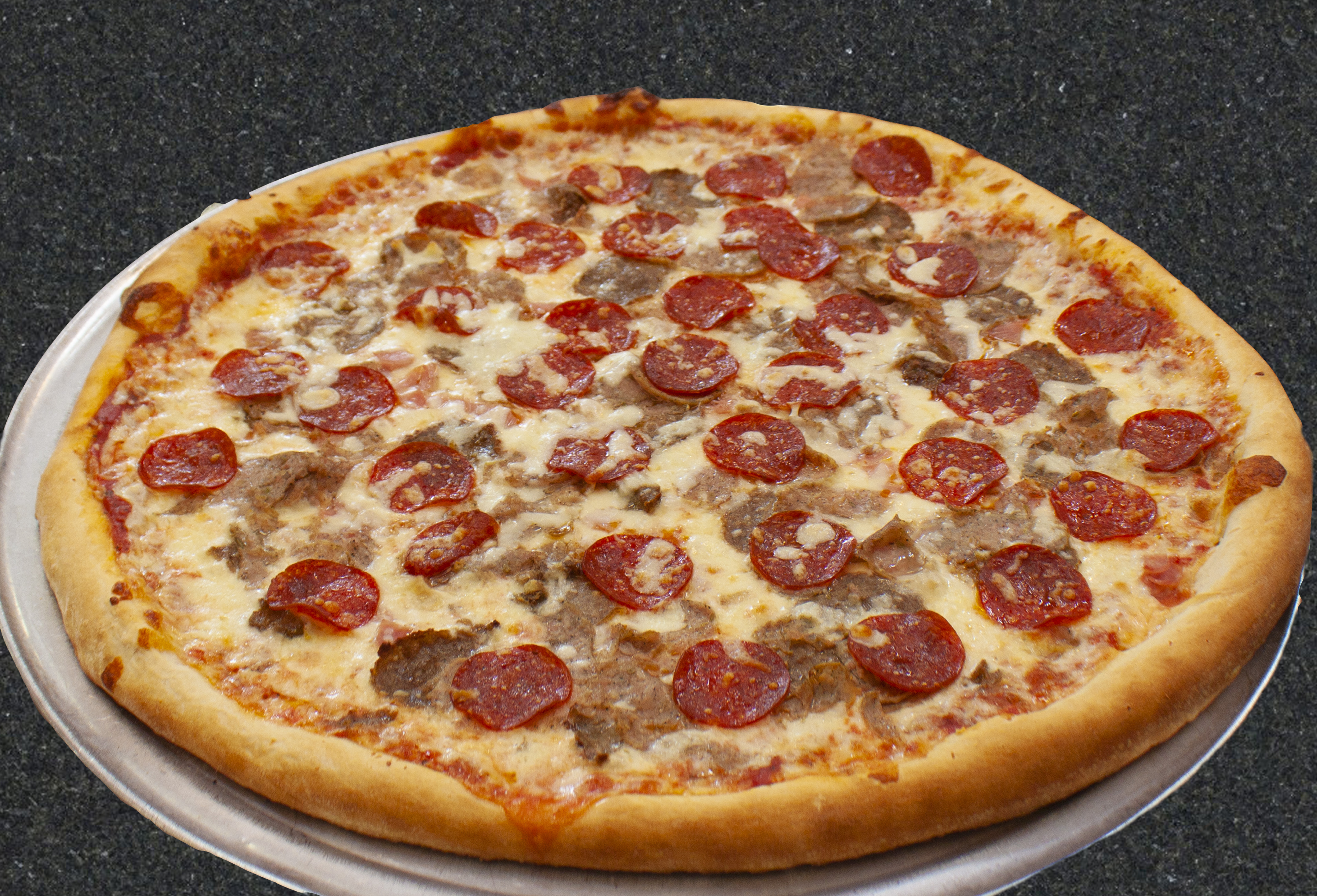 Order Meat Lovers Pizza food online from Kasa Pizza store, Cresco on bringmethat.com