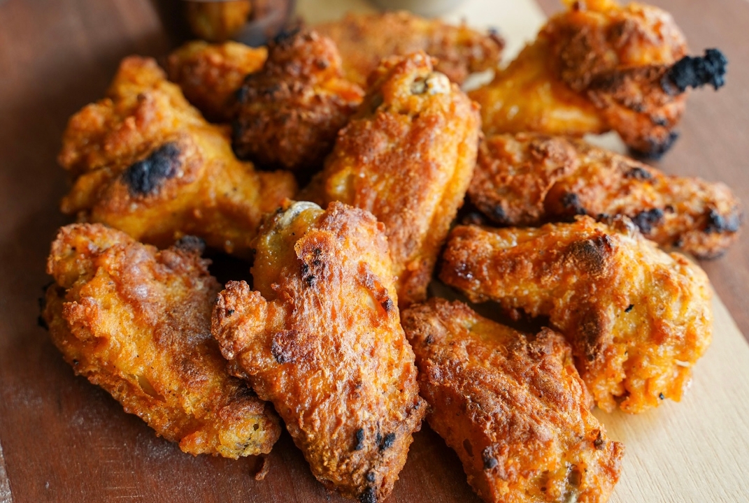 Order HOT WINGS (5PC) food online from DaddyO's Pizza store, Houston on bringmethat.com