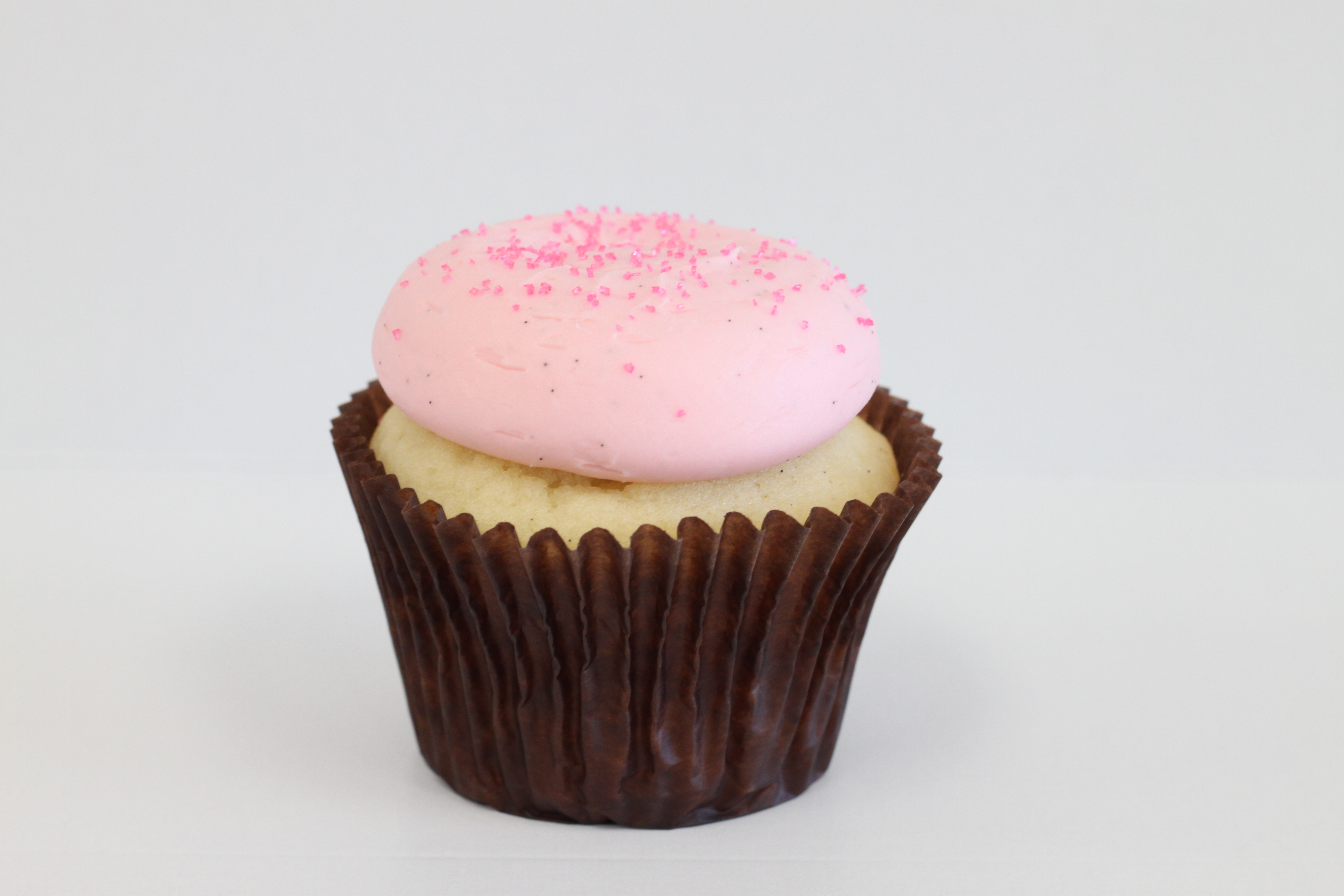 Order Pink Vanilla Cupcake food online from Smallcakes Cupcakery And Creamery store, Garhanna on bringmethat.com