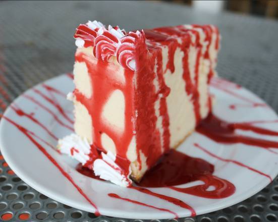 Order Strawberry Cheesecake food online from Reginellis Pizzeria store, New Orleans on bringmethat.com