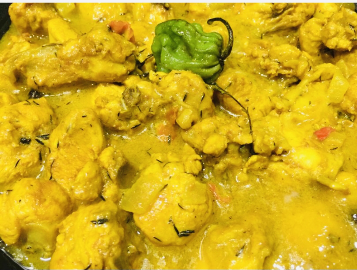 Order Curry Chicken food online from Mum's Jamaican Restaurant store, Raleigh on bringmethat.com