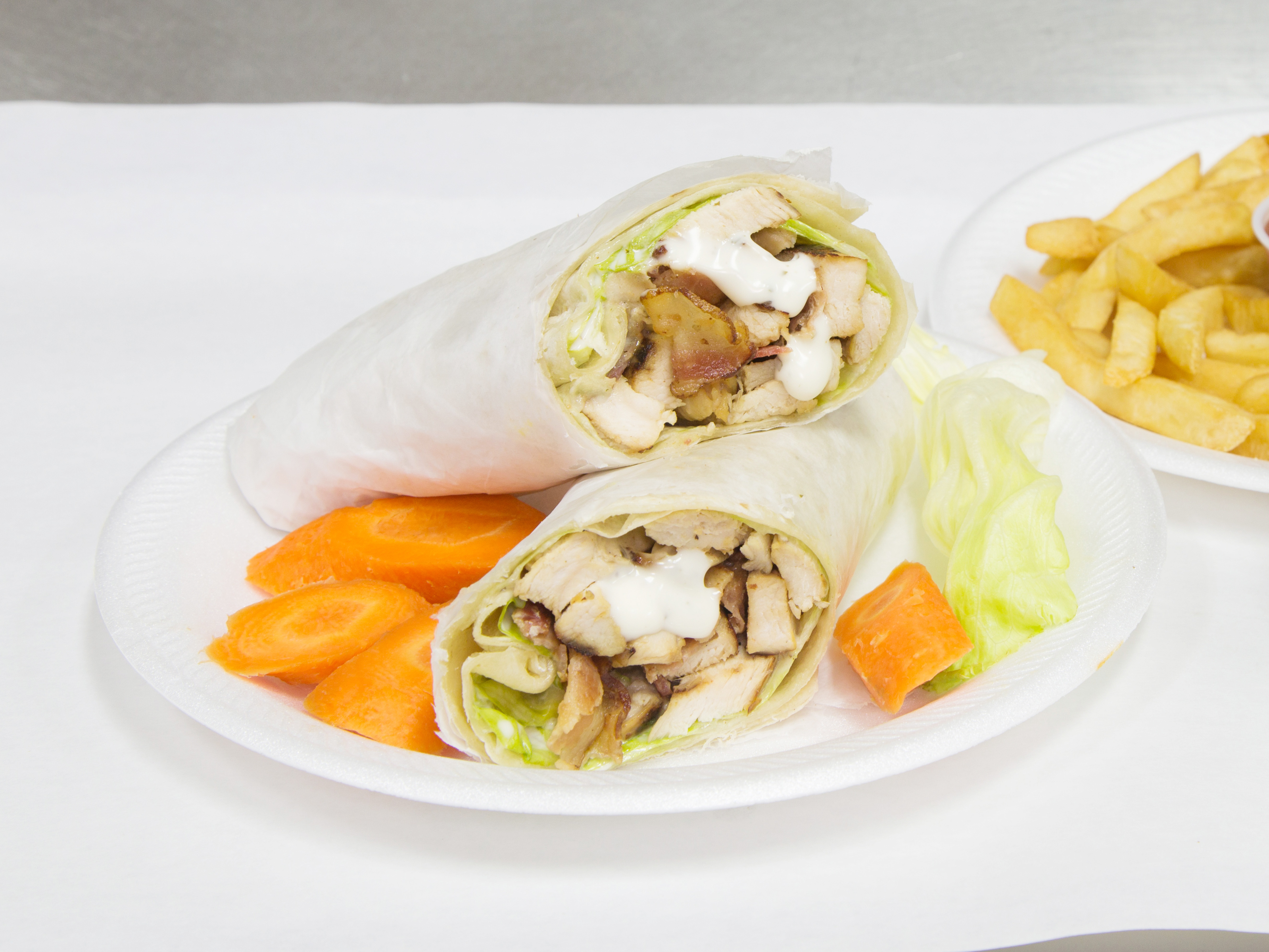 Order Chicken Caesar Wrap food online from Earle Cafe store, Jersey City on bringmethat.com