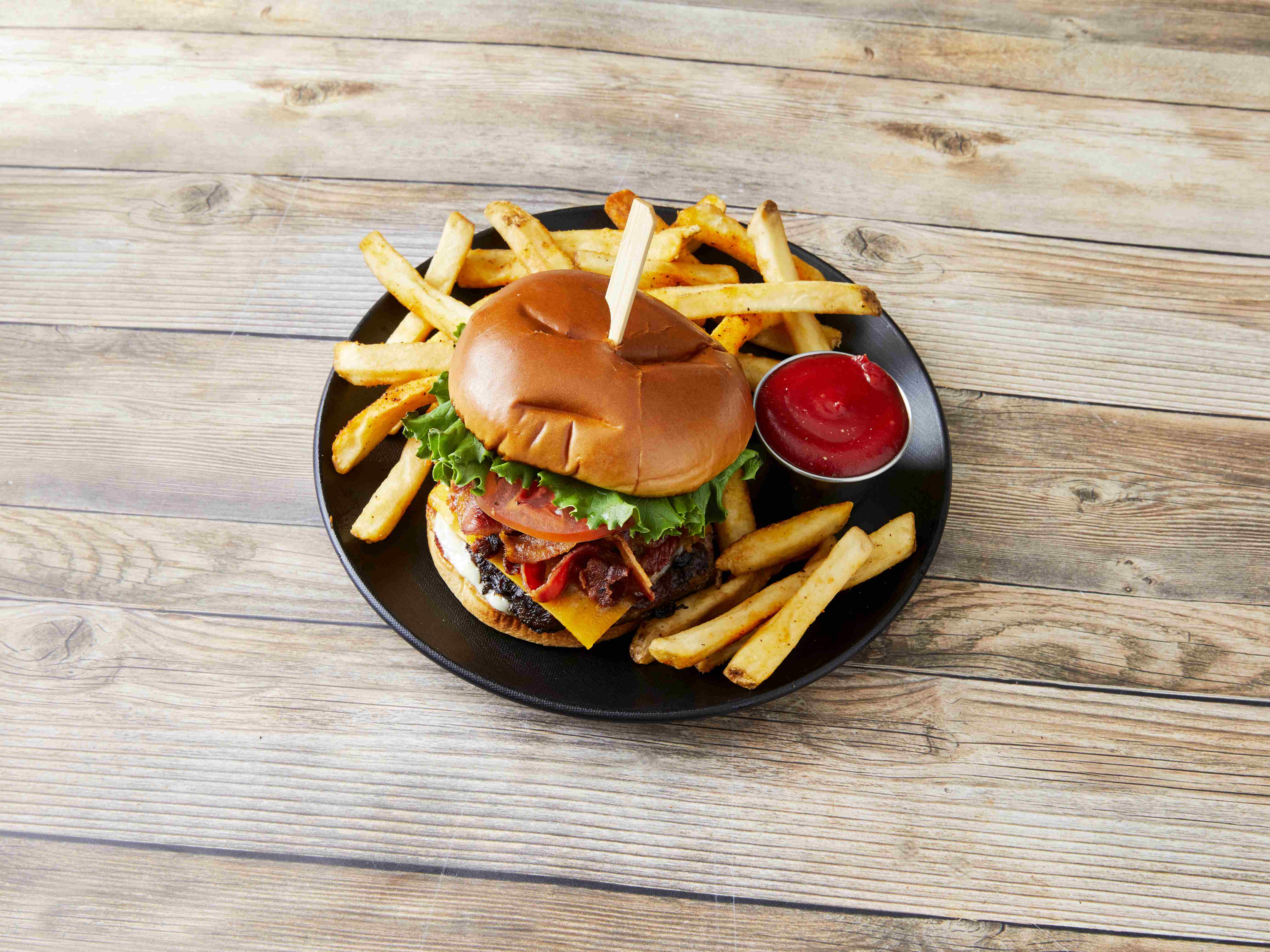 Order Cheddar and Bacon Burger food online from Brann Steakhouse & Grille store, Bay City on bringmethat.com