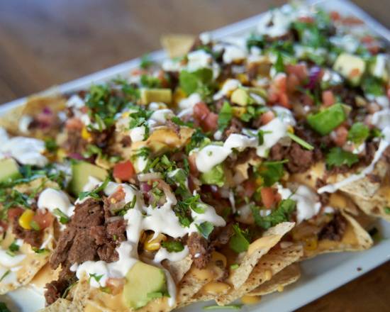 Order Nachos food online from The Funky Monk store, Tucson on bringmethat.com