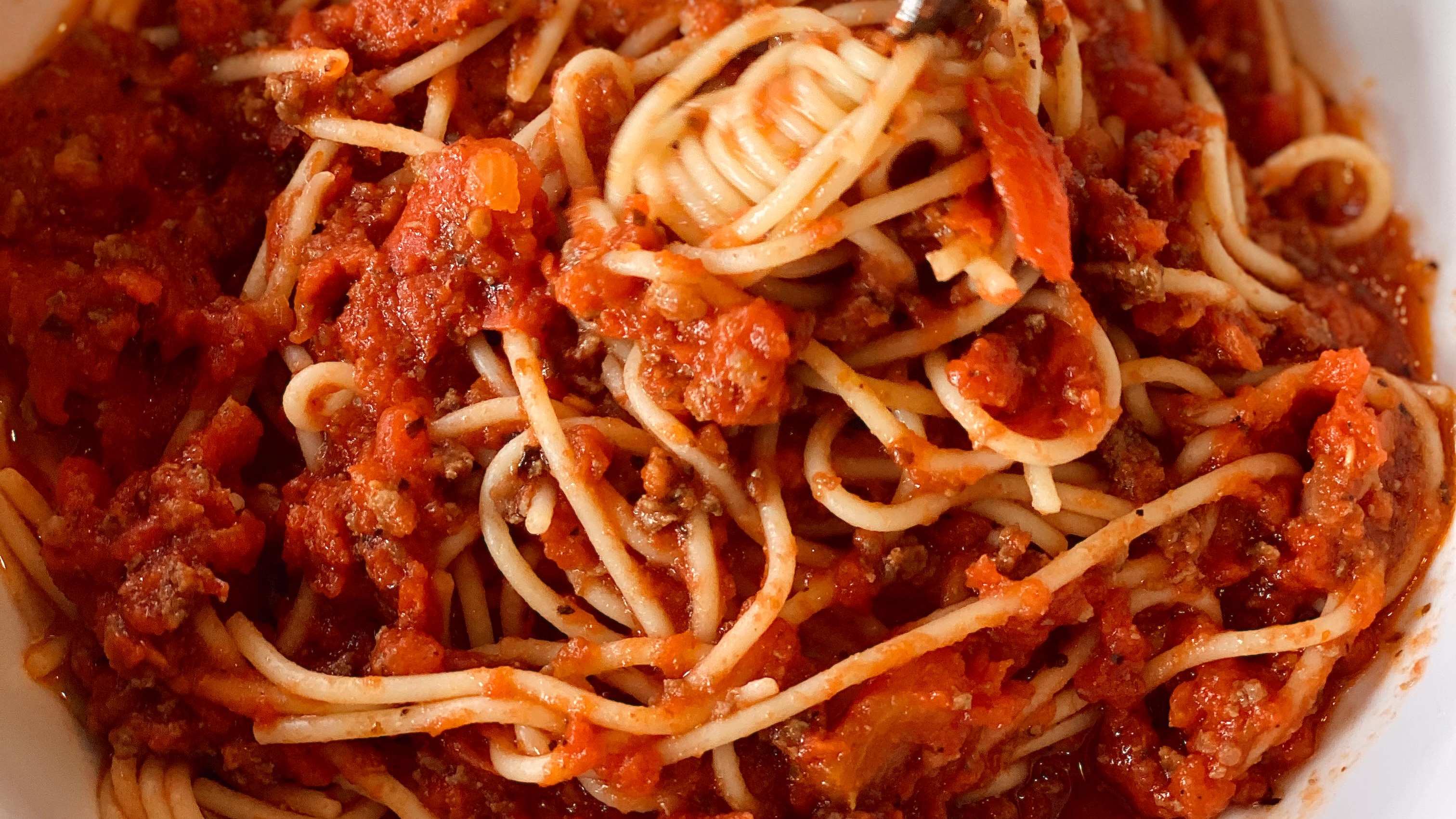 Order Spaghetti & Meat Sauce food online from Angelico Pizzeria and Cafe store, Washington on bringmethat.com