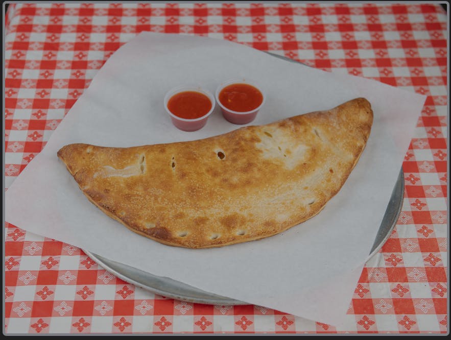 Order Build your own Calzone - Small food online from Pizza Seven store, Houston on bringmethat.com