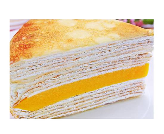 Order Mango Crepe Cake food online from Vivi Cafe store, Quincy on bringmethat.com