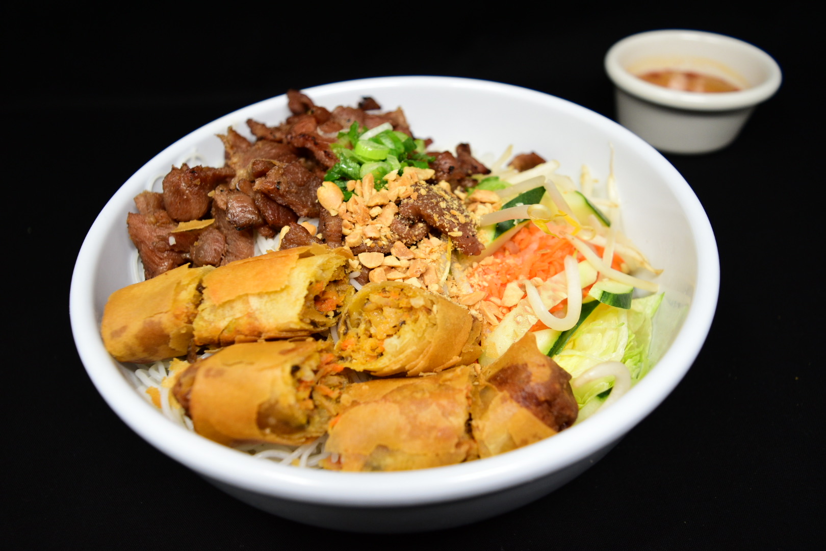 Order 48. Bun Thit Nuong Cha Gio/Flame broiled pork & imperial rolls food online from Fortune Star Cuisine store, Reno on bringmethat.com