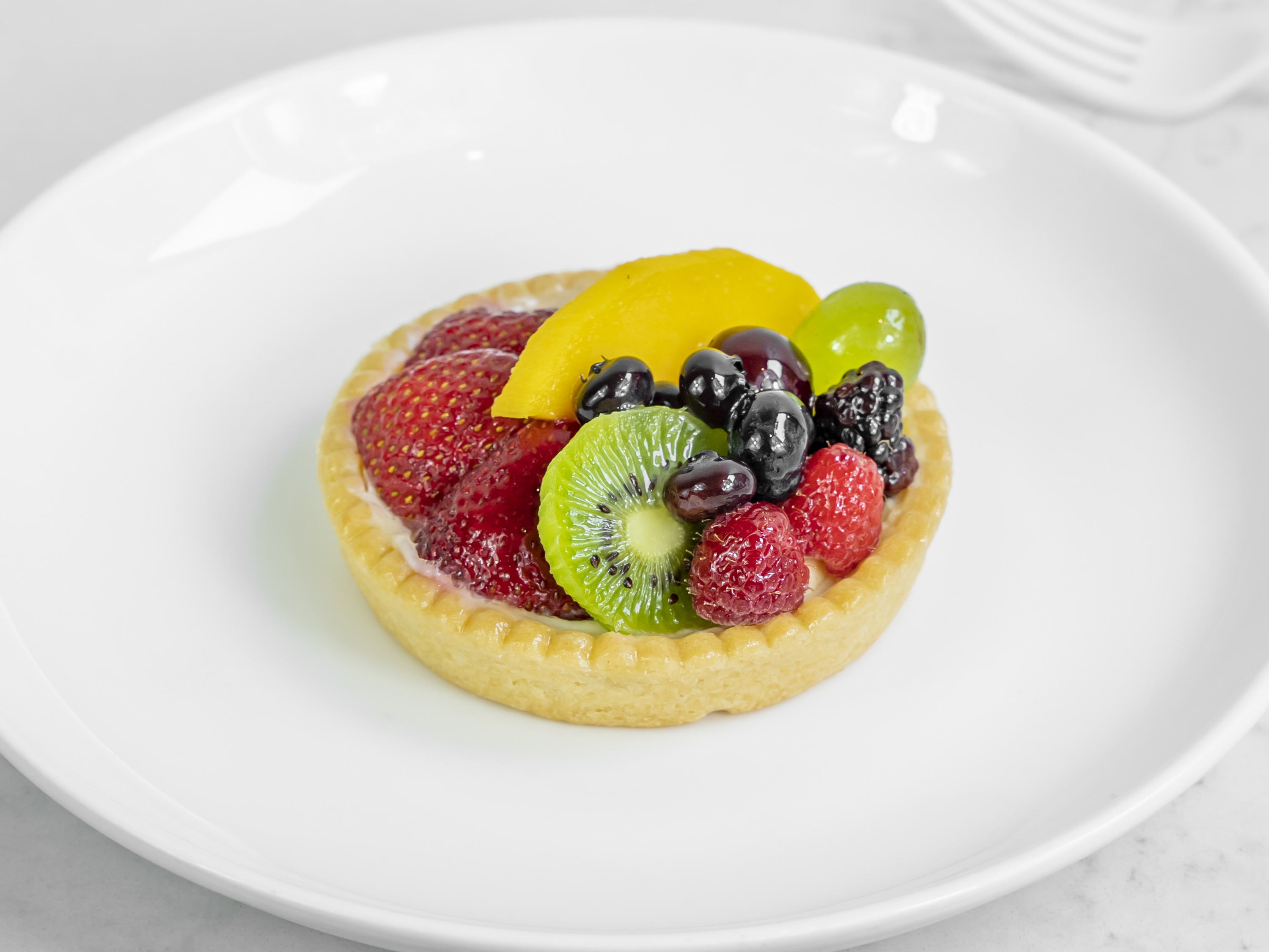 Order Mixed Fruit Tart food online from South Beach Cafe store, San Francisco on bringmethat.com