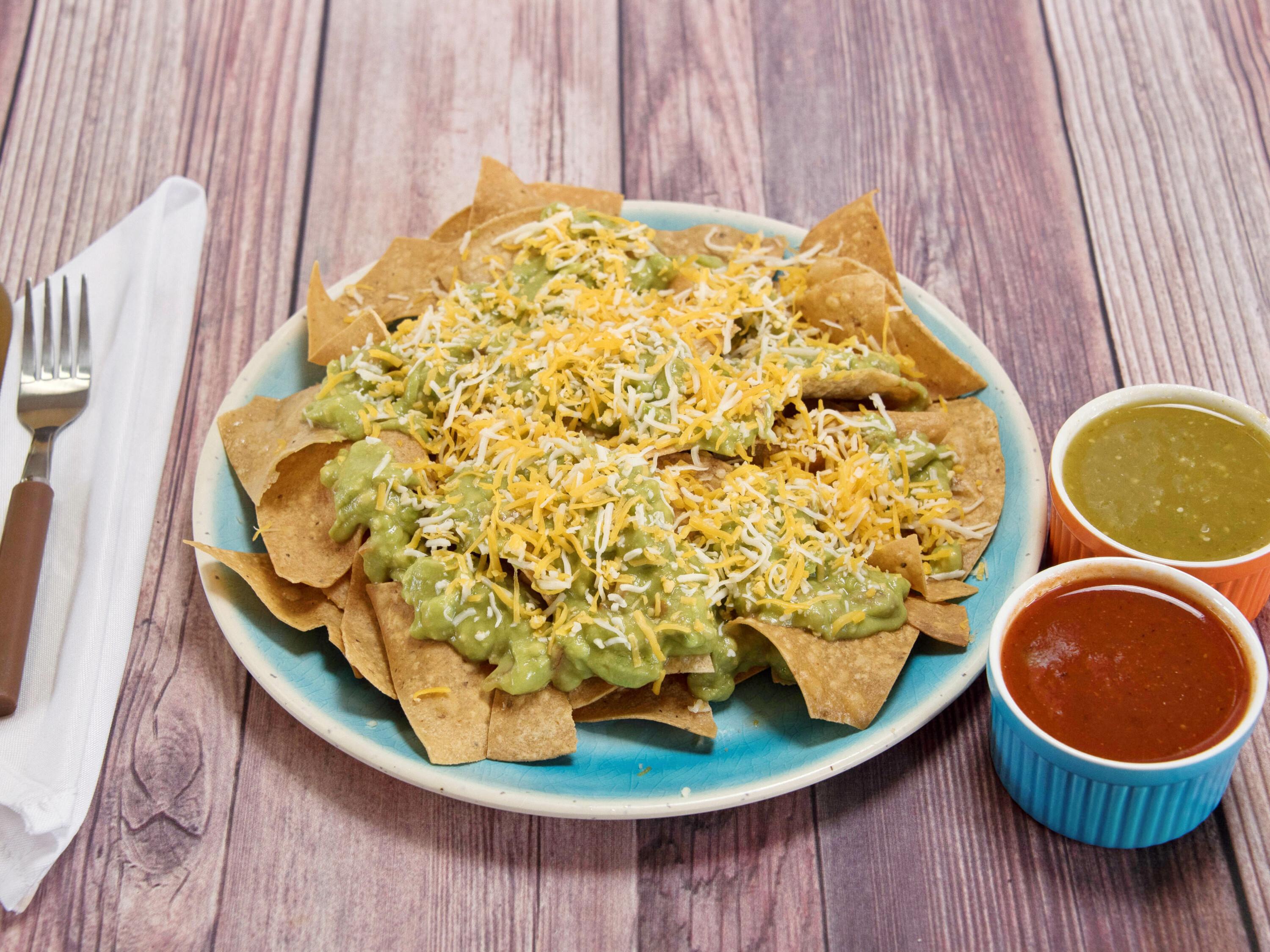 Order Chips with Guacamole Only food online from Nandos Taco Shop store, Lemon Grove on bringmethat.com