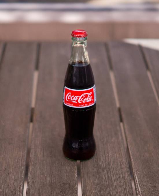 Order Mexican Bottled Coke food online from Taquiero Taco Patio store, Aliso Viejo on bringmethat.com