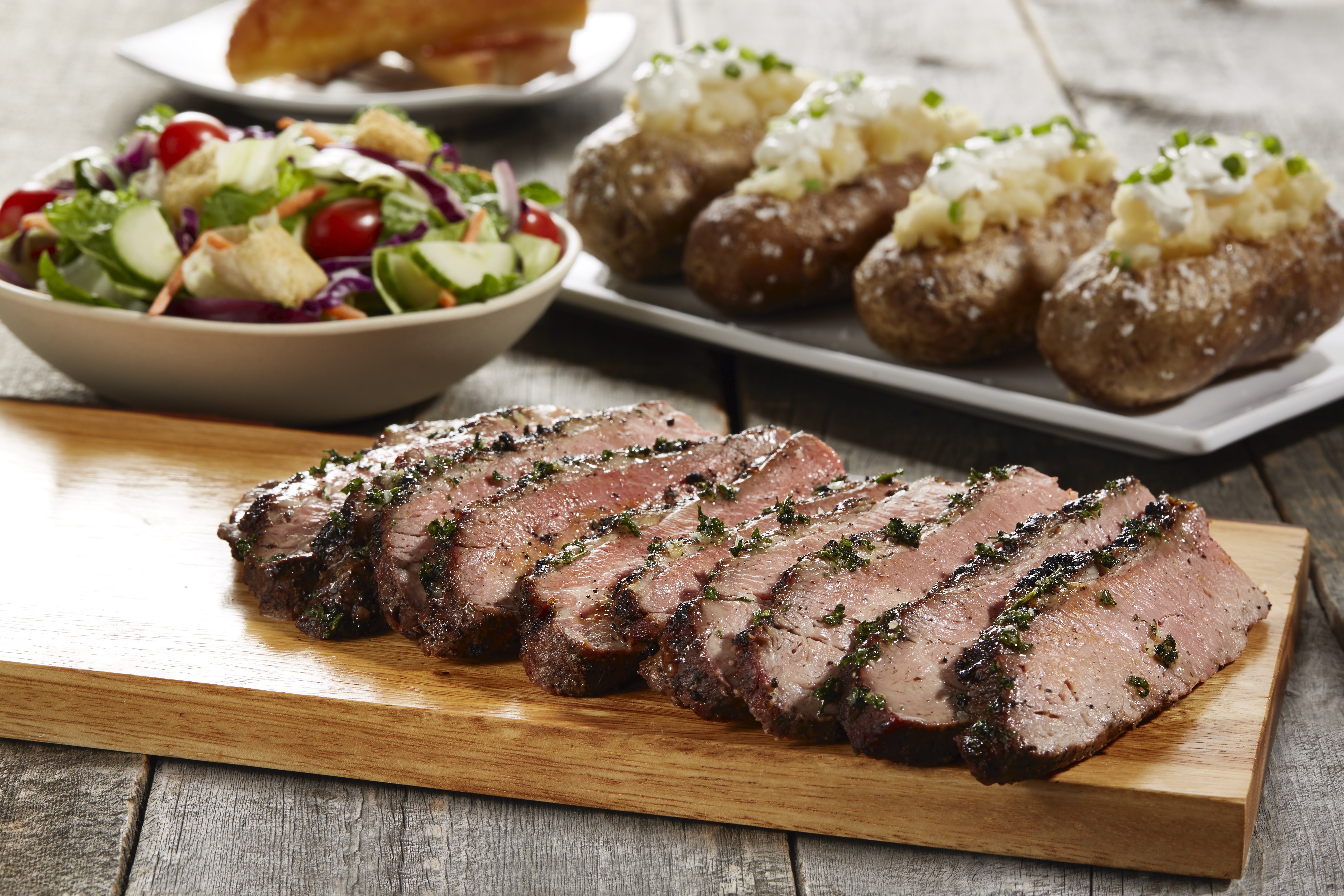 Order Sliced Grilled Tri Tip Family Meal for 4 food online from Sizzler store, Downey on bringmethat.com