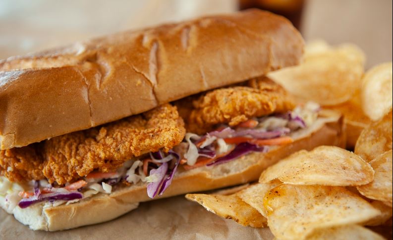 Order Lunch Catfish Po’ Boy food online from Voodoo Daddy Steam Kitchen store, Tempe on bringmethat.com