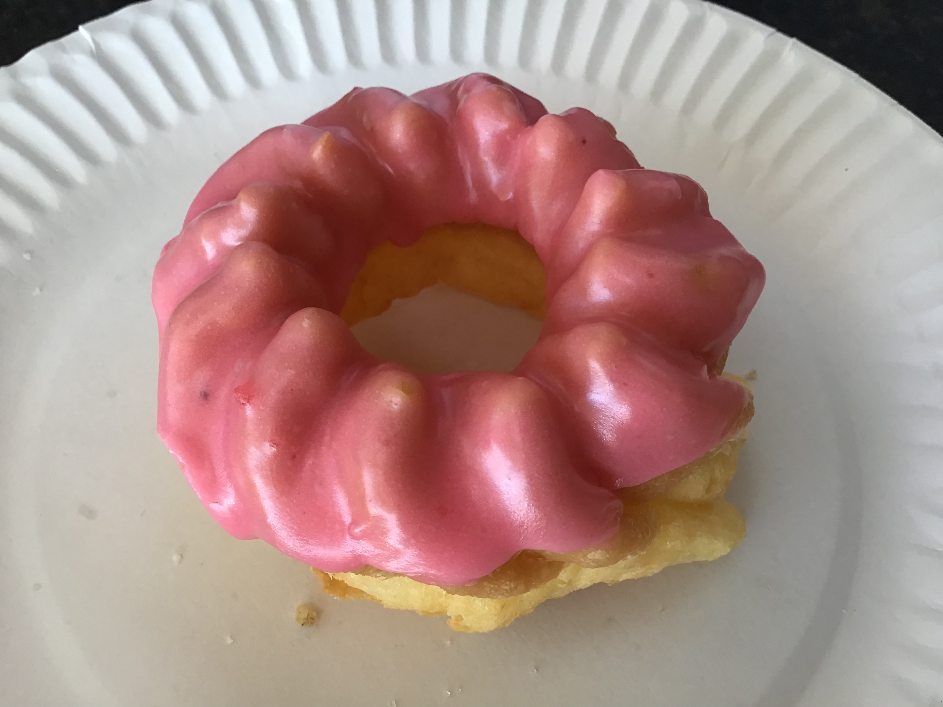 Order Strawberry French Cruller food online from Donut Basket store, Modesto on bringmethat.com