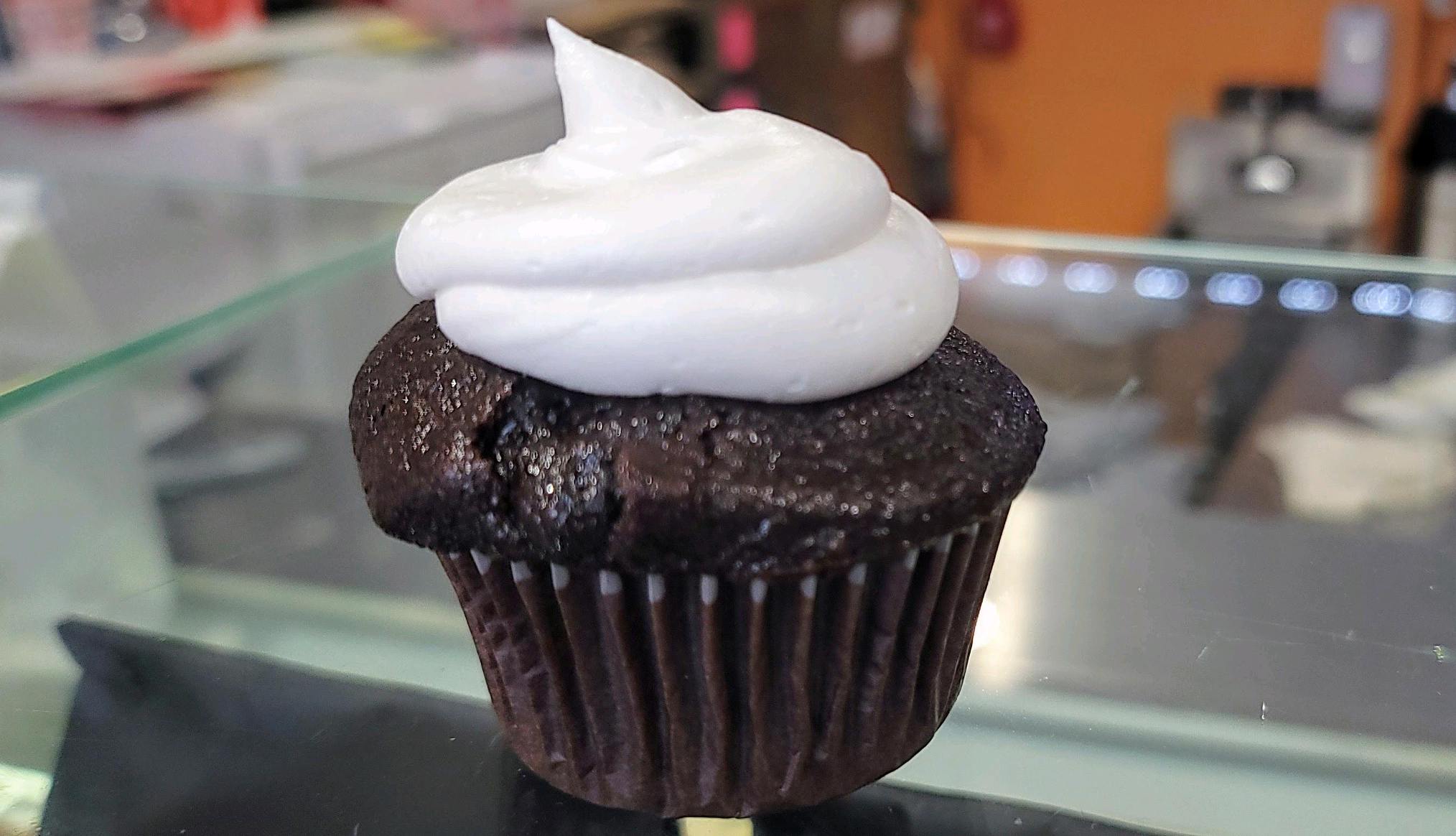 Order vegan Chocolate vanilla cupcake  food online from Baked Cravings store, New York on bringmethat.com