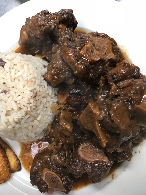 Order Dinner Ox-Tails and Beans  food online from Pimento Grill store, Maplewood on bringmethat.com