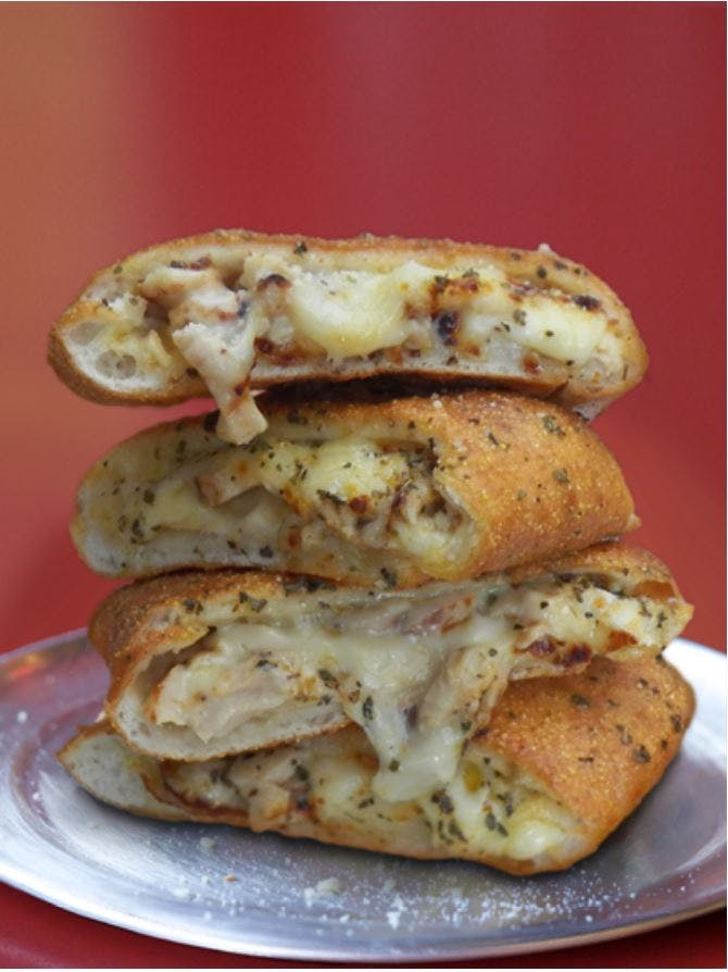 Order Chicken Cheesesteak Stromboli - Medium food online from DoubleDave's Pizzaworks store, Houston on bringmethat.com