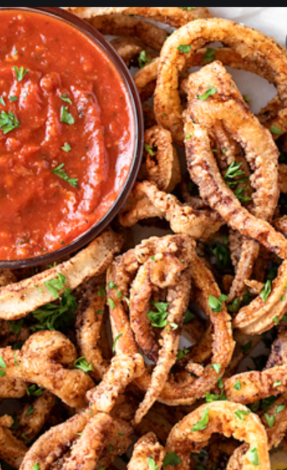 Order PARMESAN CALAMARI food online from Austin's Saloon and Eatery store, Libertyville on bringmethat.com