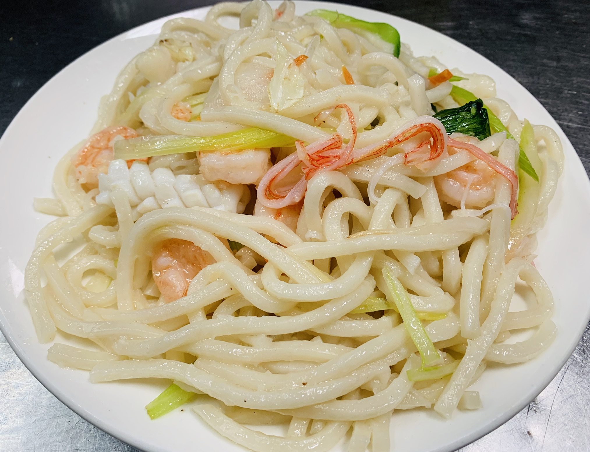 Order Sauteed Udon Noodles with Seafood food online from The Bund store, Forest Hills on bringmethat.com