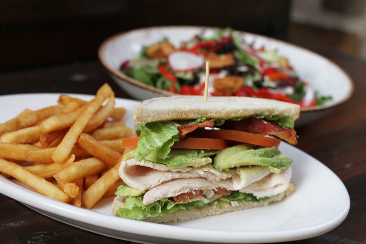 Order 1/2 Sandwich + Salad food online from Lazy Dog store, Rancho Cucamonga on bringmethat.com