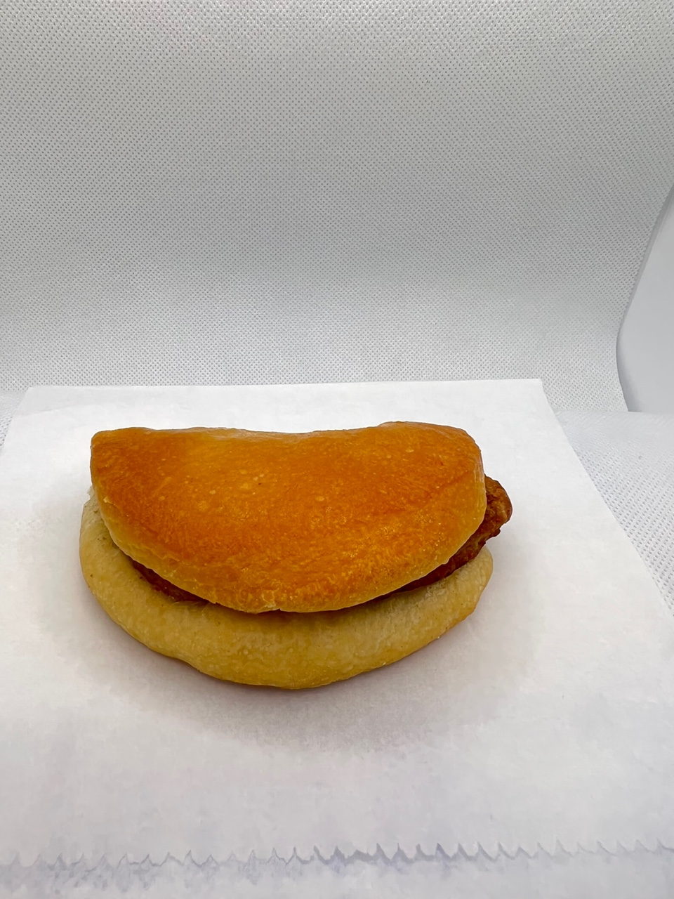 Order Sausage biscuit food online from Fresh & Creamy Donuts store, Lewisville on bringmethat.com