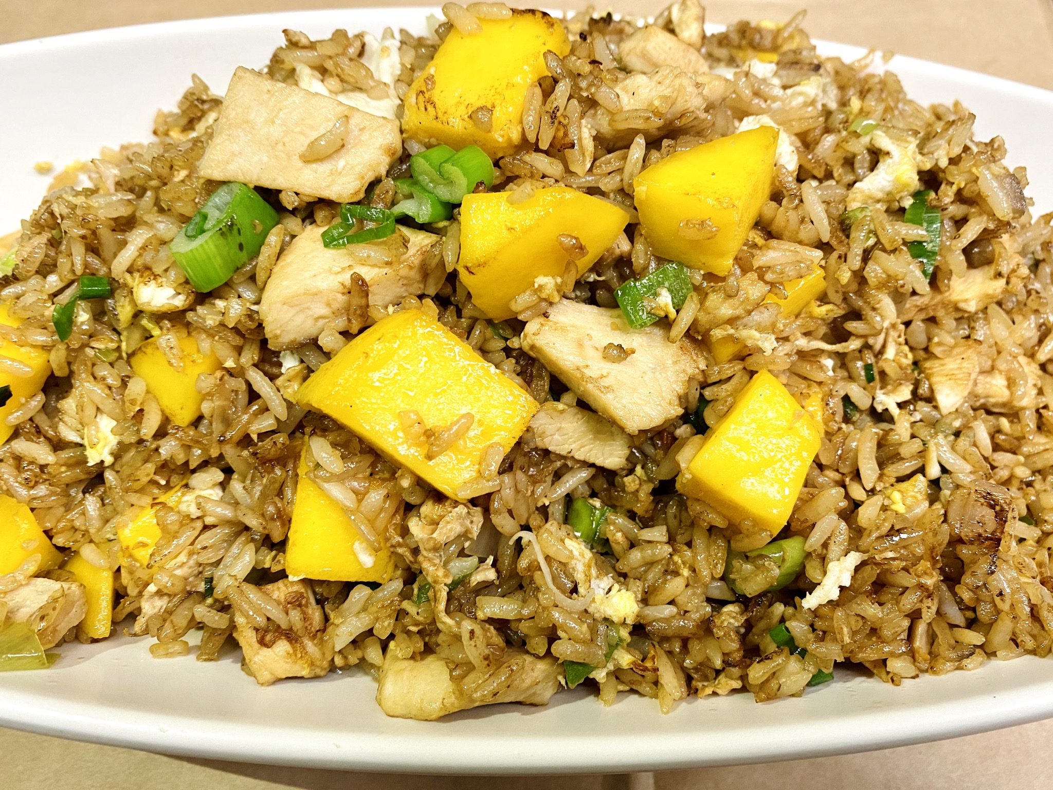 Order T25. Mango Chicken Fried Rice food online from Min Min Asian Cafe store, Chicago on bringmethat.com