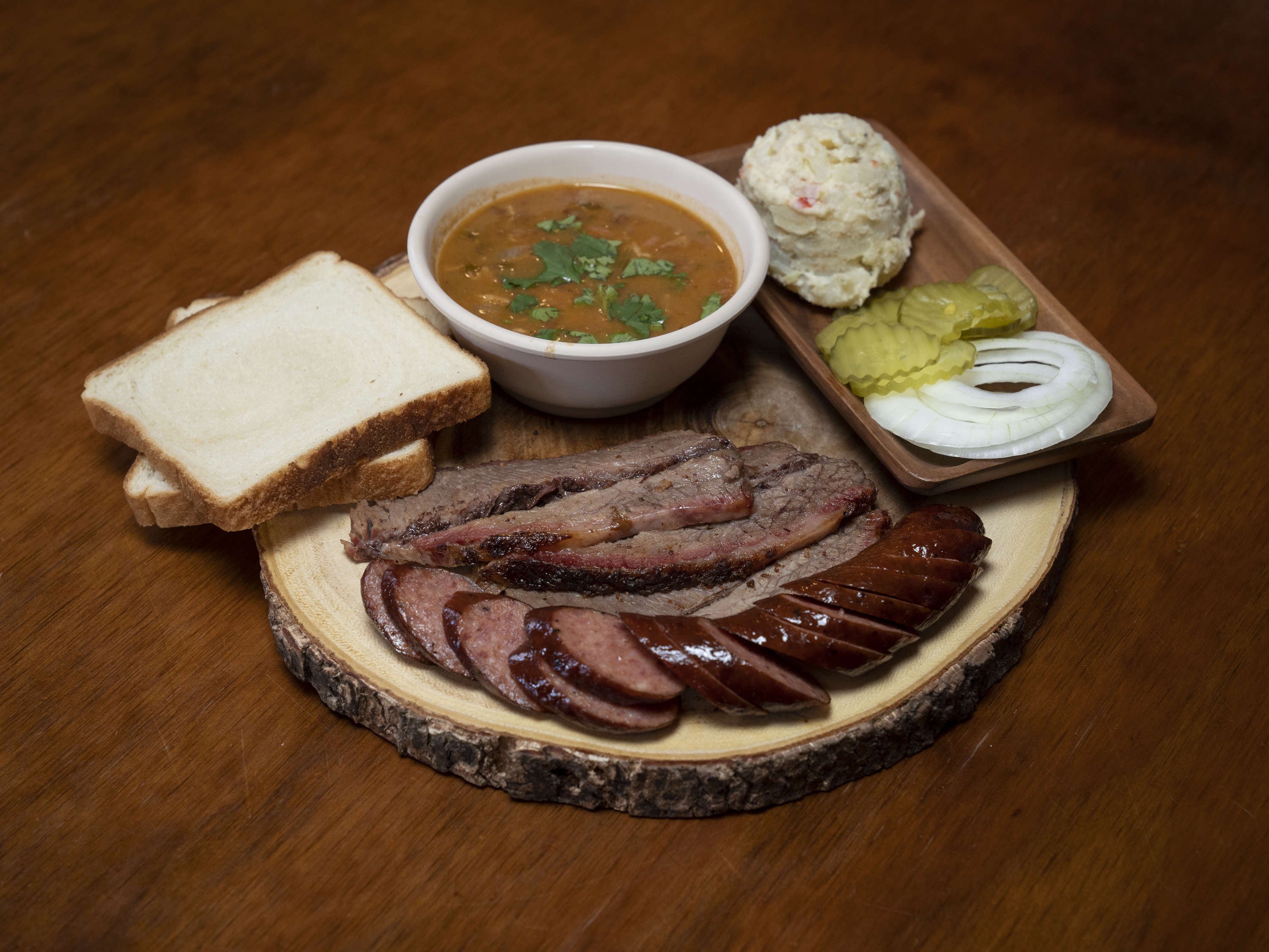 Order 11. Two Meat Combo Plate food online from Briskets & Beer Smokehouse store, Laredo on bringmethat.com