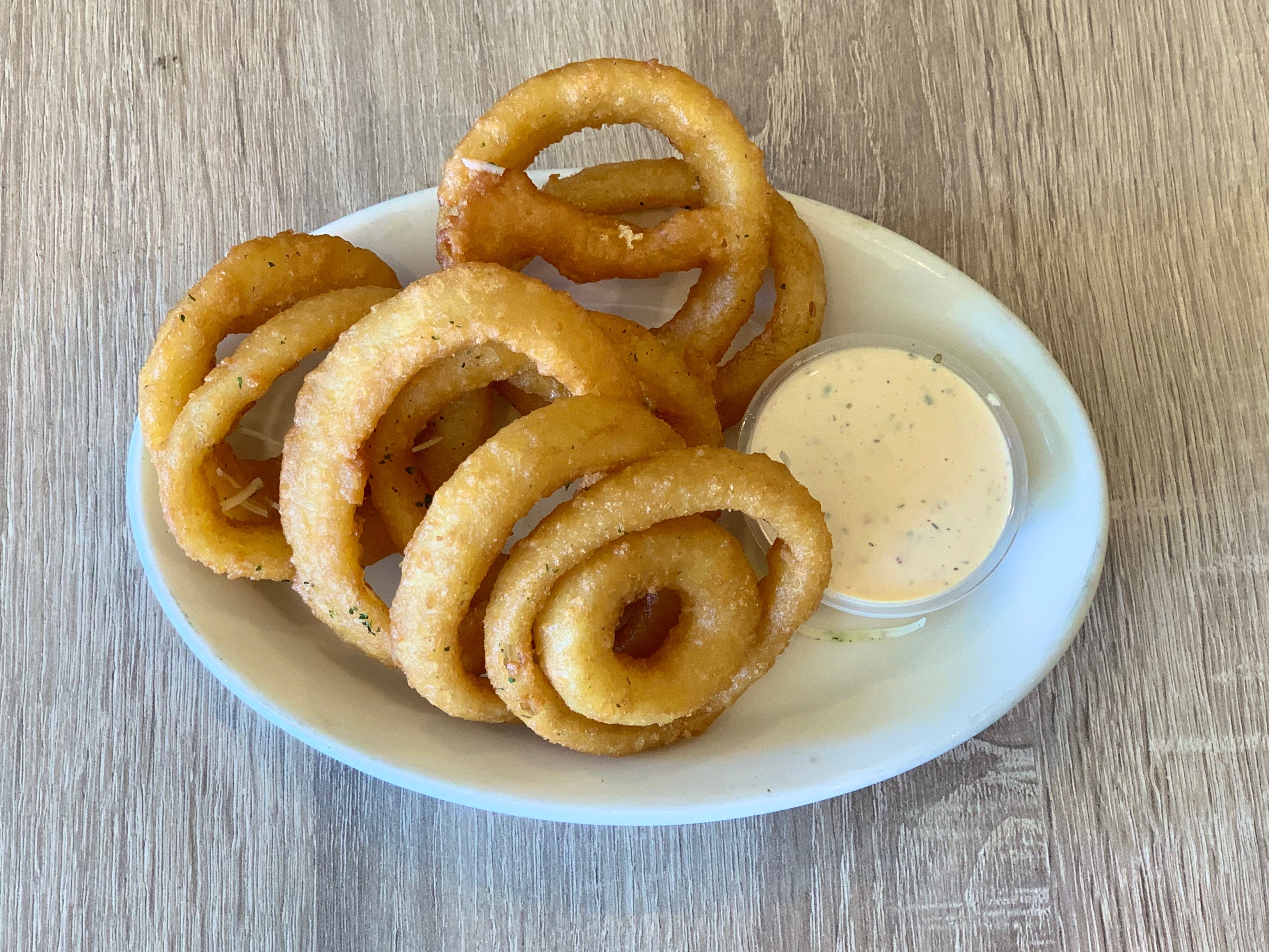 Order Beer-battered Onion Rings food online from Mikayla's Cafe store, Santa Clara on bringmethat.com