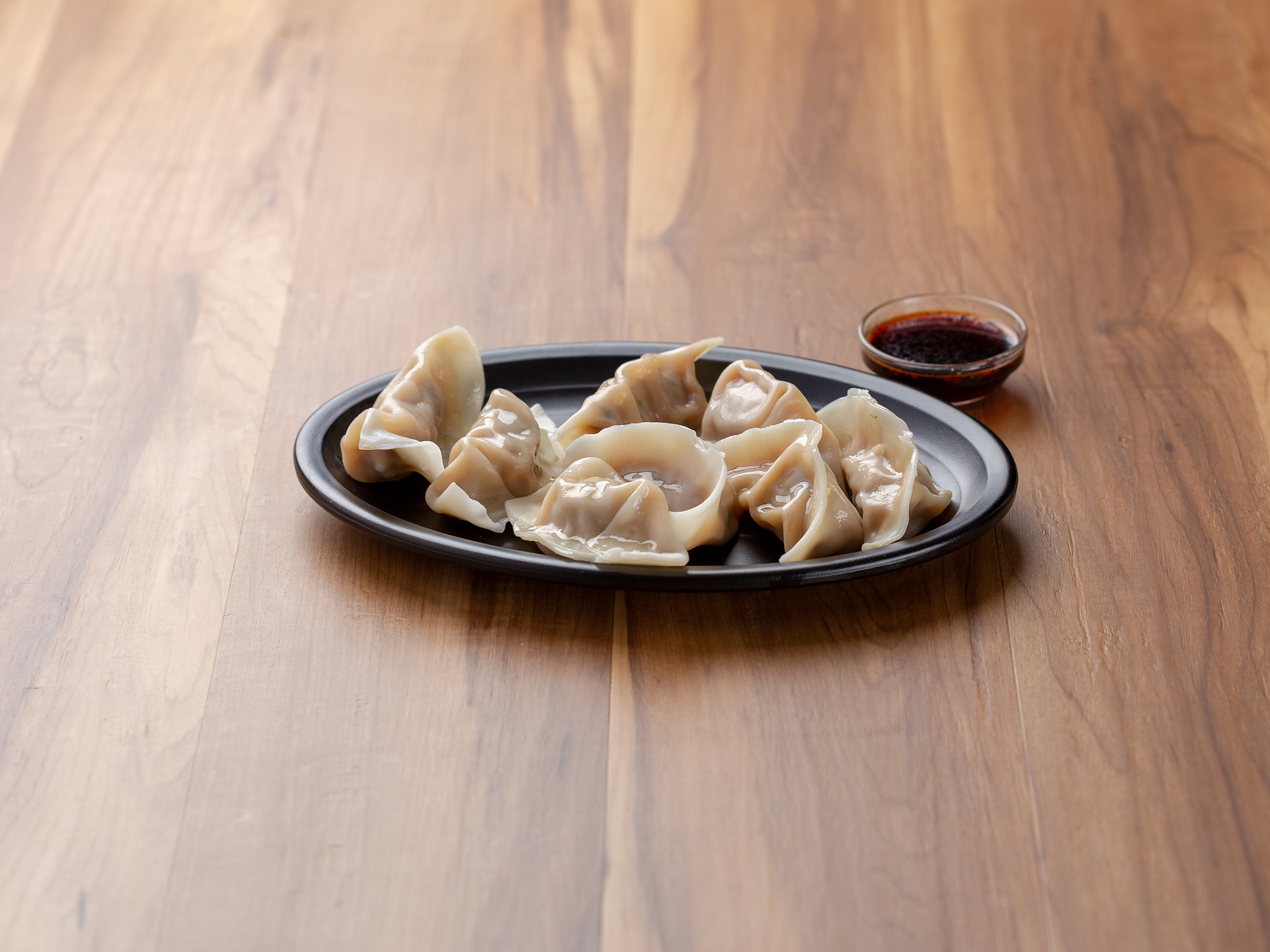 Order A10. Steamed Pork Dumplings food online from Hot Wok Chinese Restaurant store, Linthicum Heights on bringmethat.com