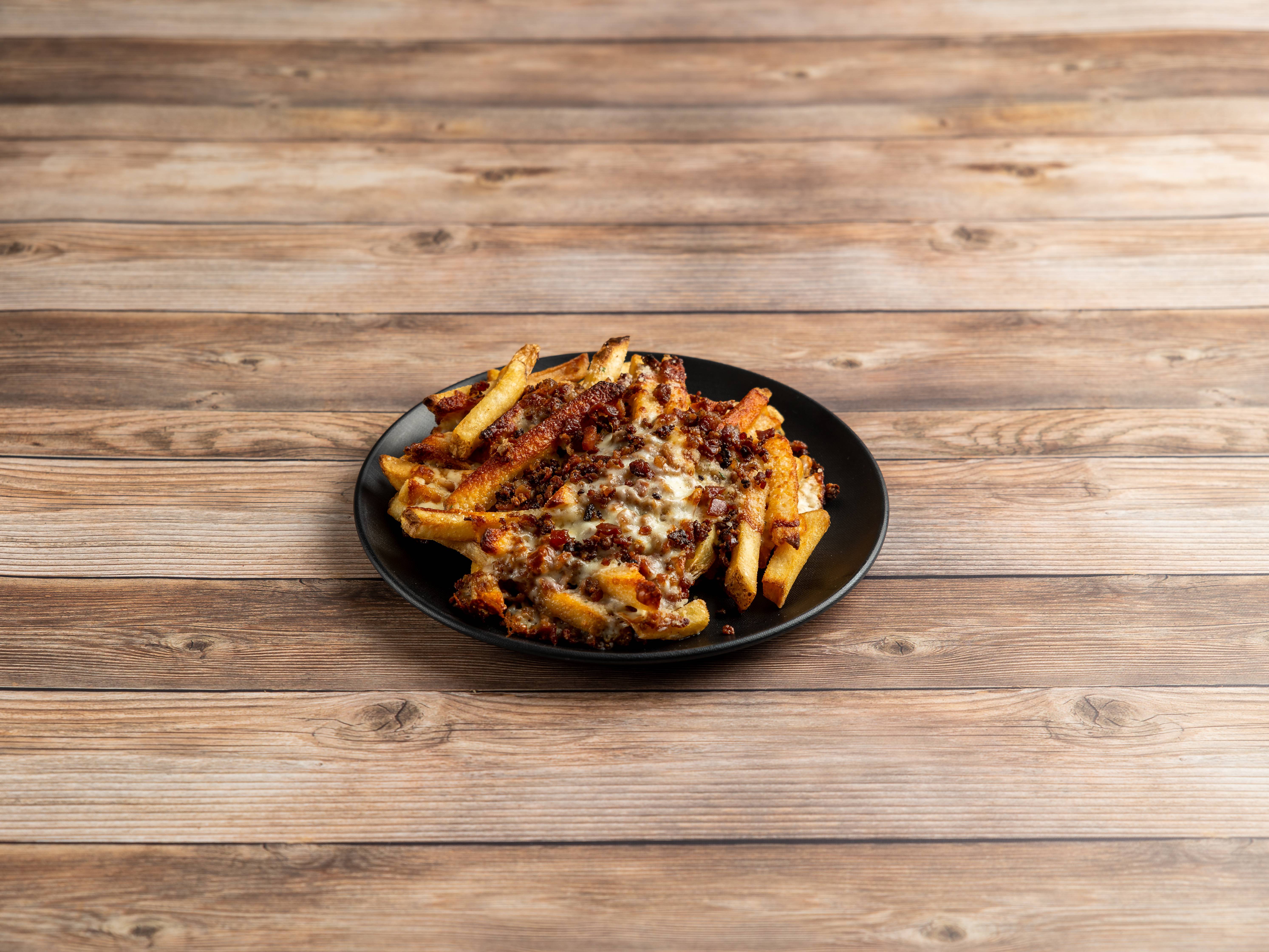Order Bacon Cheese Fries food online from Antonios Pizza store, Norfolk on bringmethat.com