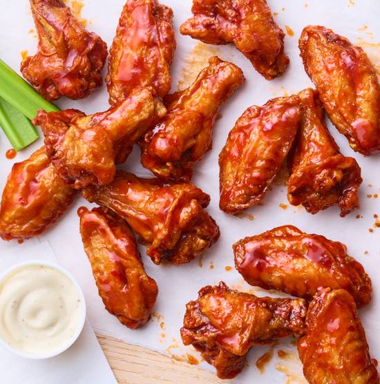 Order Traditional Chicken Wings food online from Cosmic Wings store, Erie on bringmethat.com