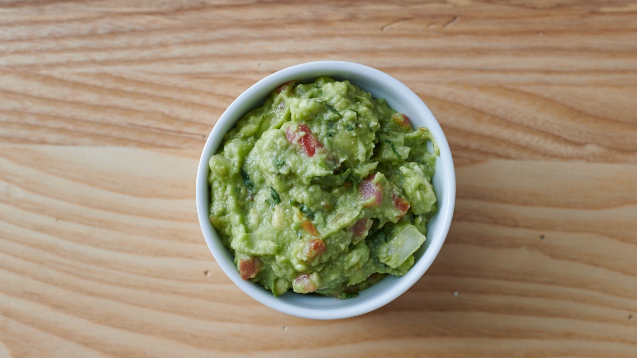 Order SIDE GUAC - LARGE food online from Burrito Beach store, Chicago on bringmethat.com
