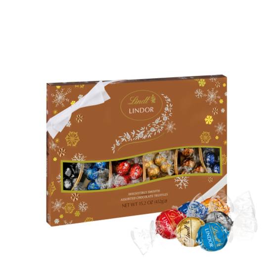 Order Lindt LINDOR Holiday Deluxe Assorted Chocolate Candy Truffles Gift Box, 15.2 oz. food online from Cvs store, CANTON on bringmethat.com