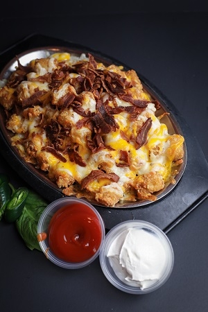 Order Cheesy Tater Tots food online from The Brickyard store, Woburn on bringmethat.com