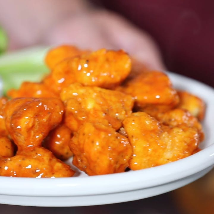 Order Boneless Wings - 1/2 lb. food online from Penny Five Star Pizza store, Lake Odessa on bringmethat.com