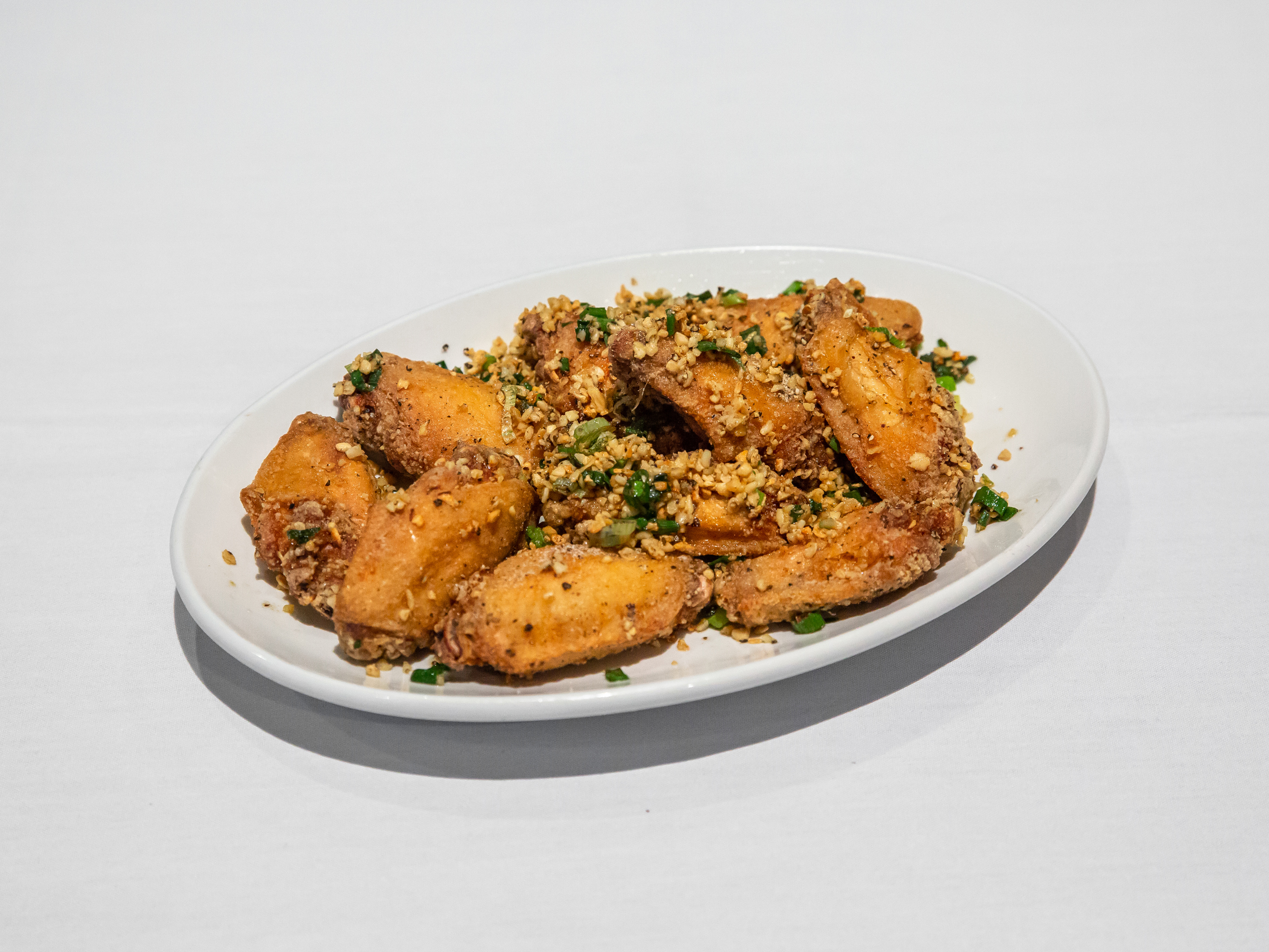 Order Peppercorn Wings food online from PPQ Dungeness Island store, San Francisco on bringmethat.com