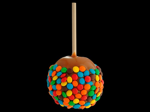 Order Caramel Apple featuring M&M's Candies food online from Rocky Mountain Chocolate Factory store, Salt Lake City on bringmethat.com