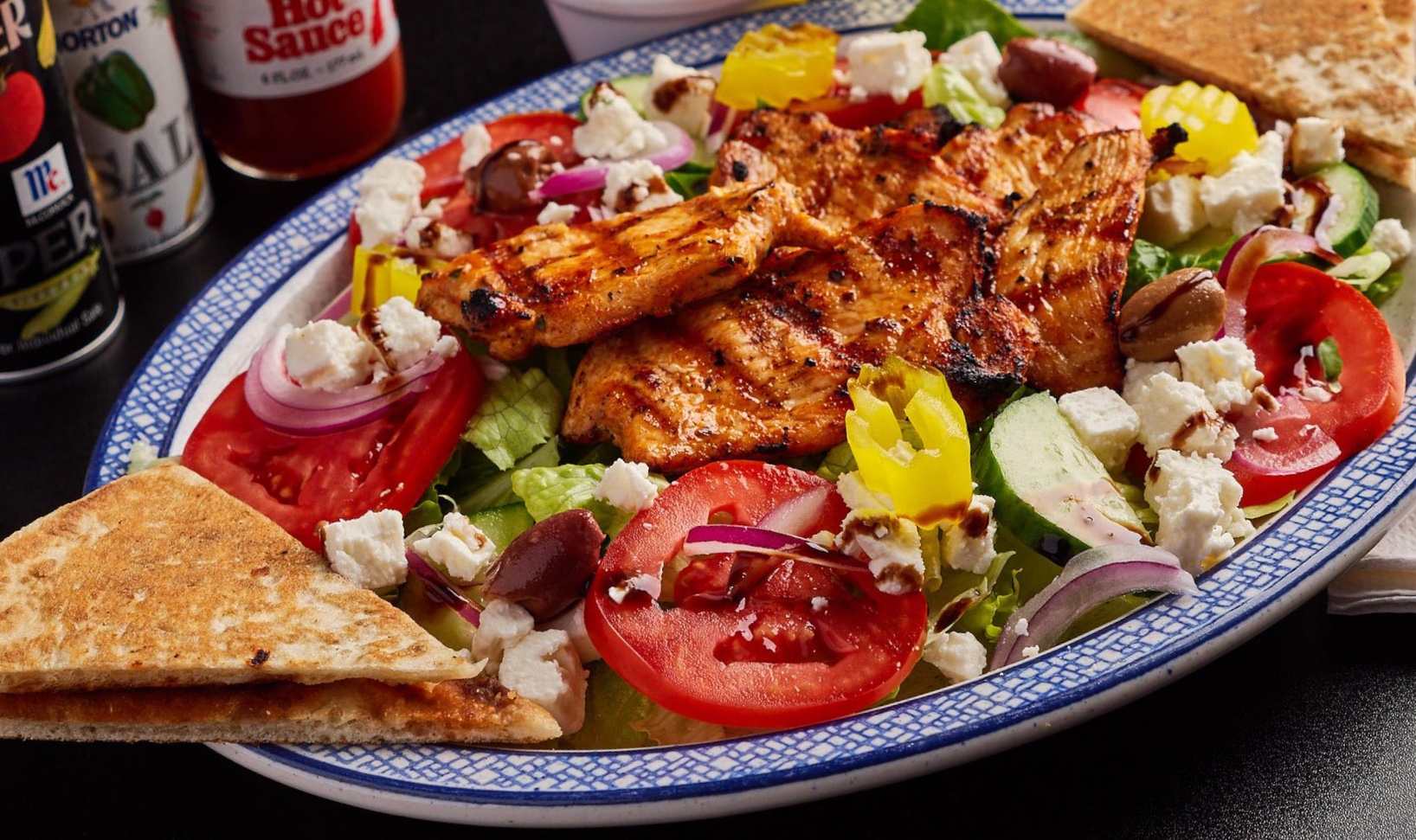 Order Grilled Chicken over Greek Salad food online from Brother's Grill store, Myrtle Beach on bringmethat.com