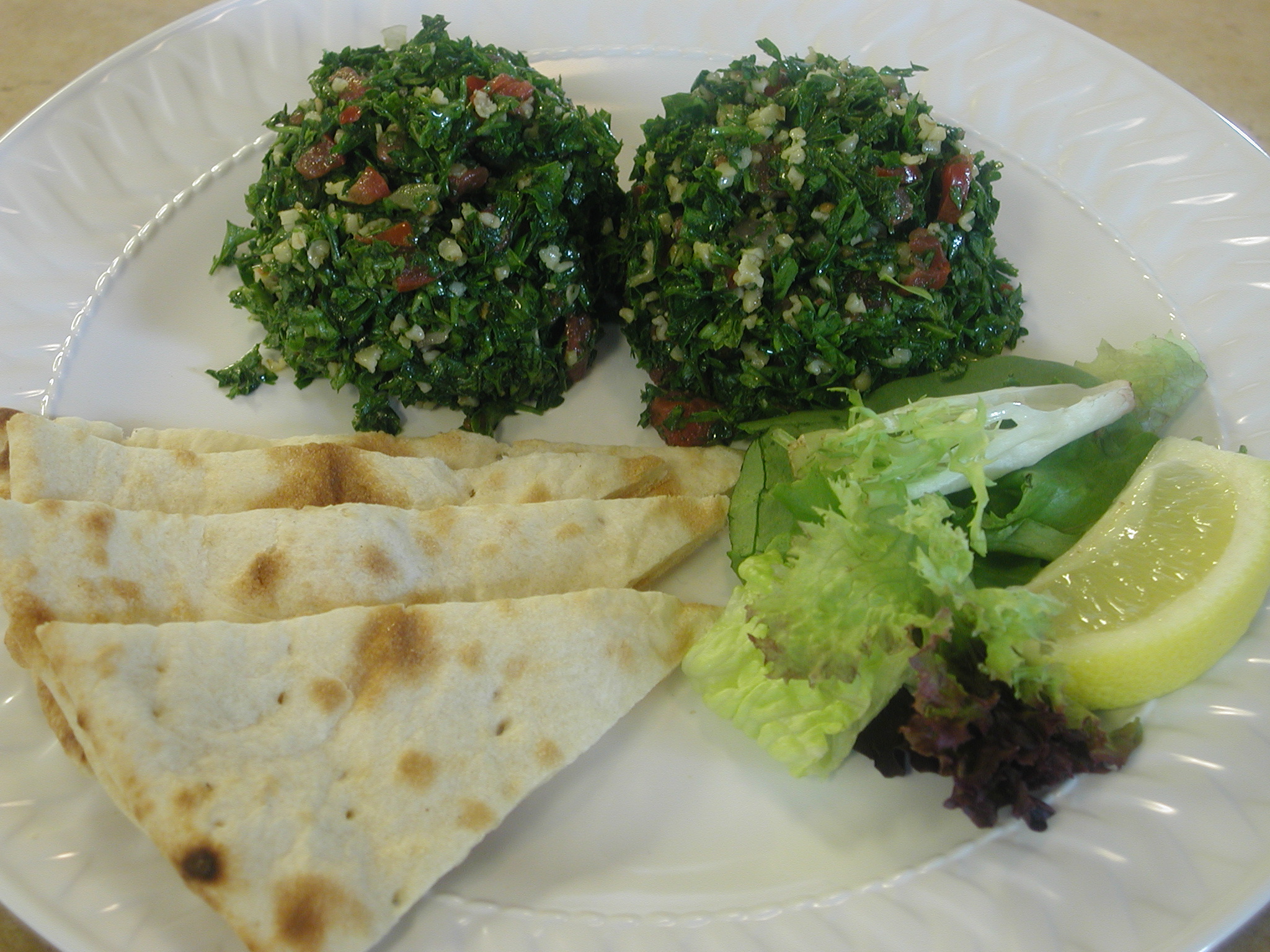 Order Tabbouleh Salad food online from Sorrento Grill store, Herndon on bringmethat.com