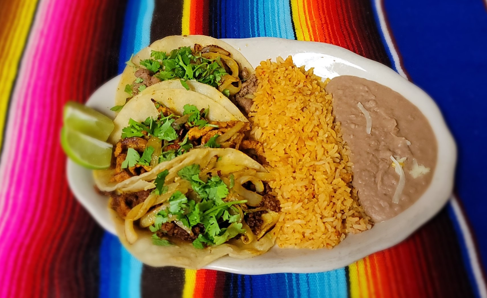 Order 1. Street Tacos food online from El Mariachi store, Bossier City on bringmethat.com