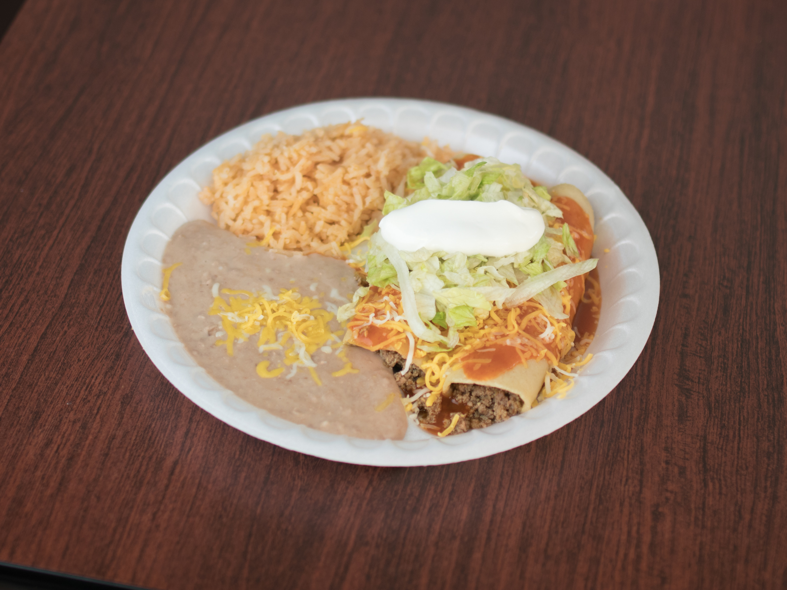 Order Ground Beef Burrito food online from Linas Mexican Restaurant store, Omaha on bringmethat.com