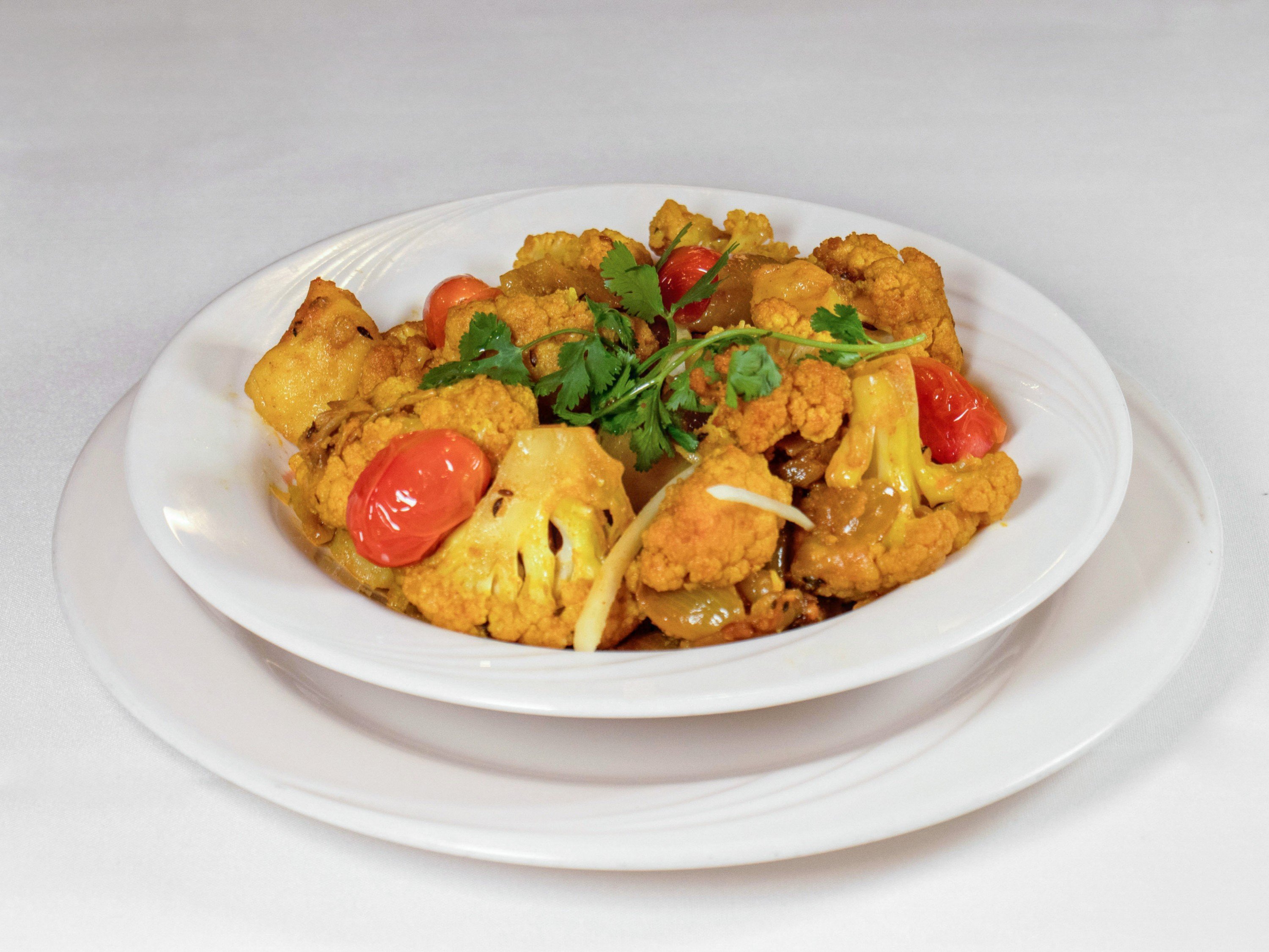 Order 5. Aloo Gobi Masala food online from Rajaji Fine Indian Cuisine store, Washington on bringmethat.com