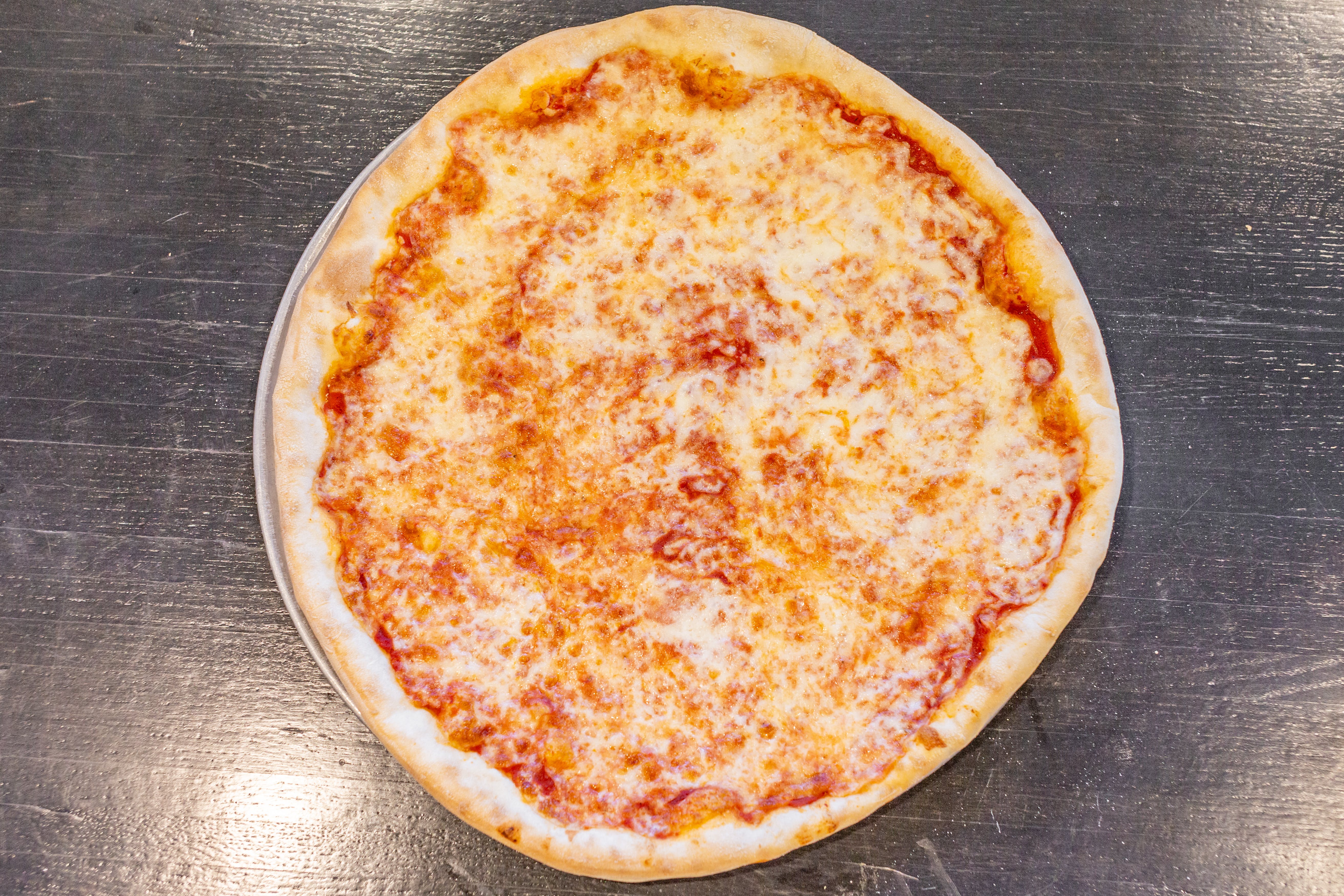 Order Cheese Pizza - Medium 14'' food online from Joey's Pizza store, Milford on bringmethat.com