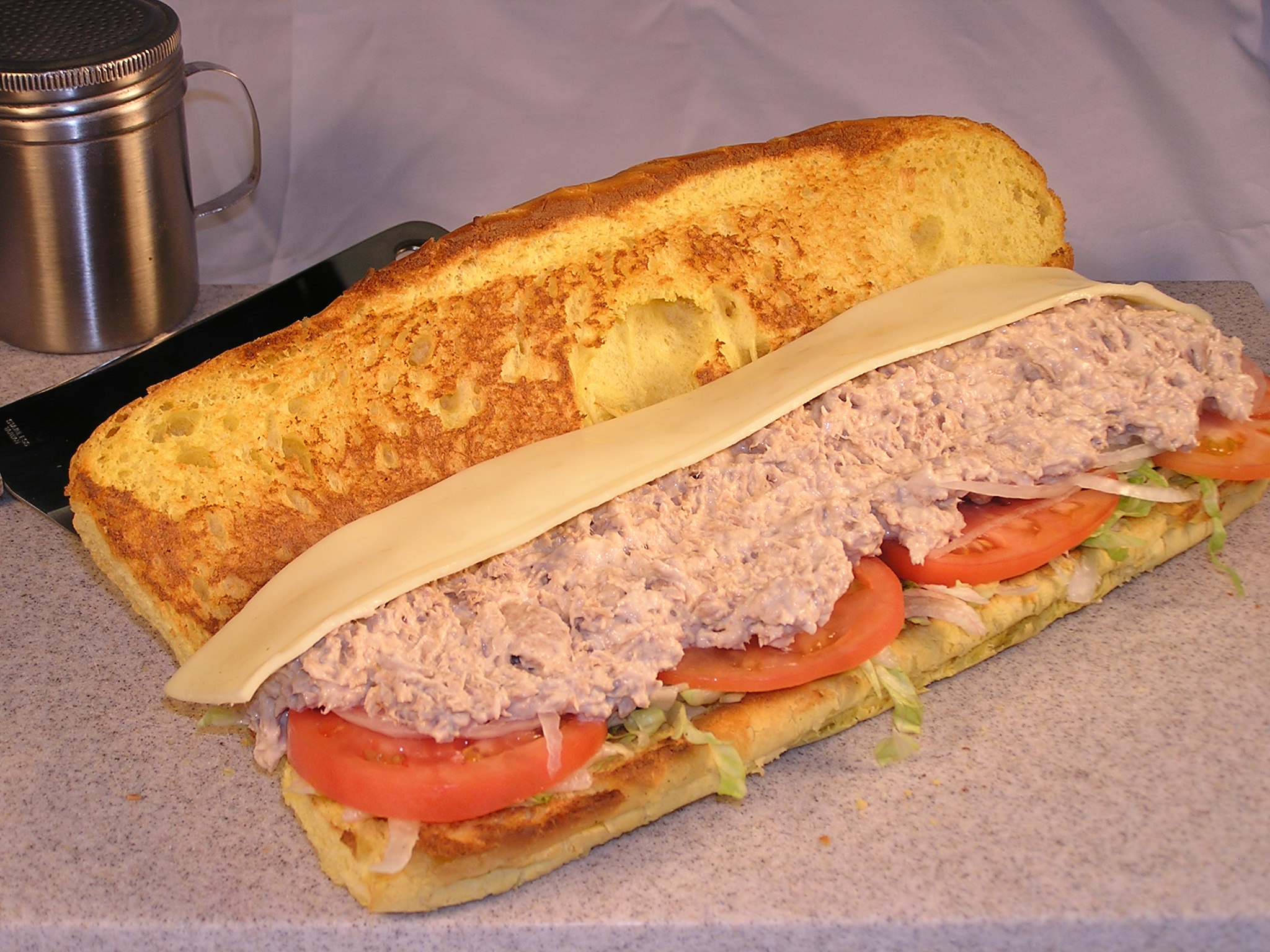 Order Tuna Fish Sub food online from Calz Pizza Subs & Chicken Wings store, Virginia Beach on bringmethat.com