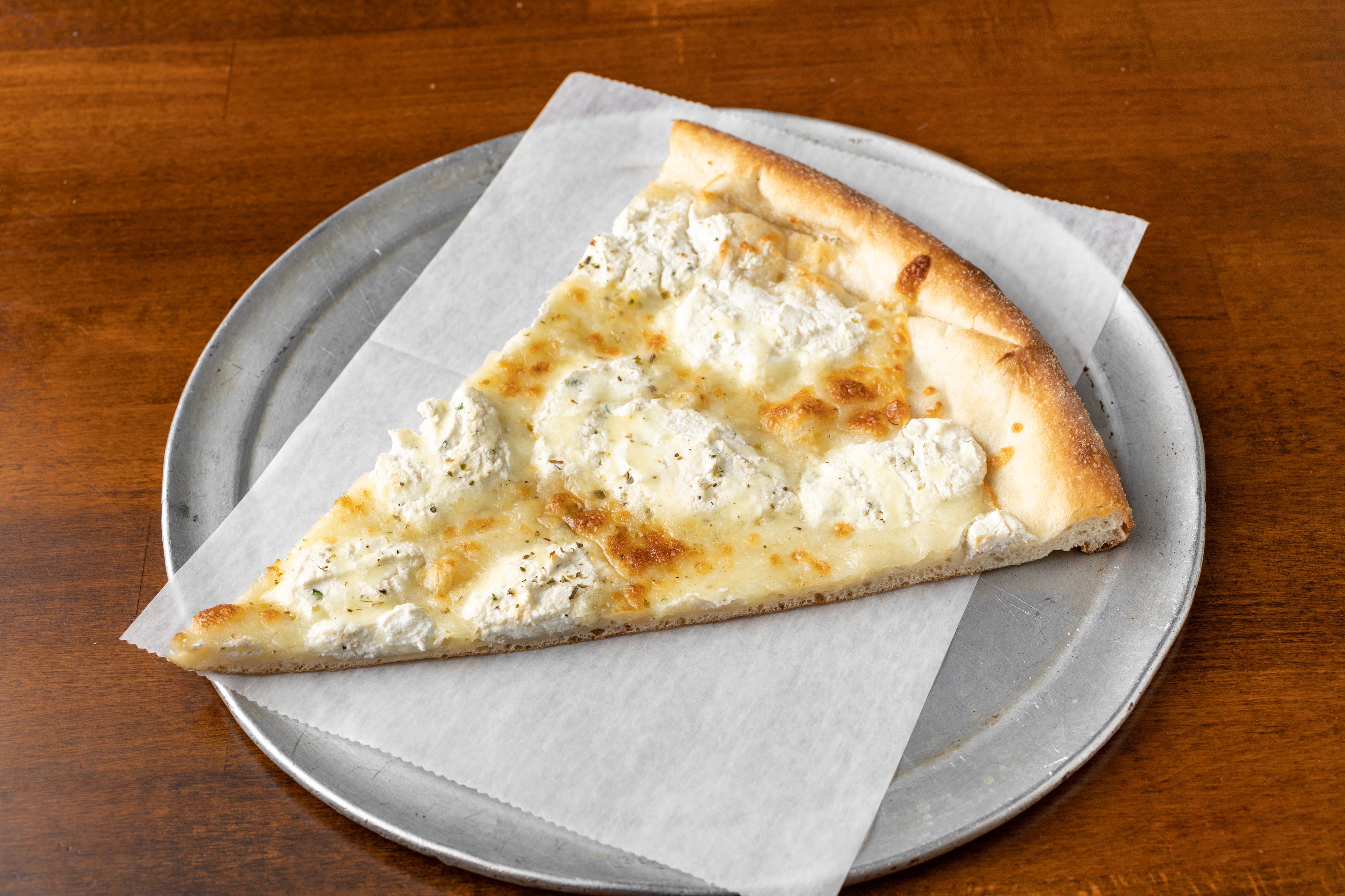 Order White Pizza Slice - White Pizza Slice food online from Due Fratelli - Jackson Heights store, Jackson Heights on bringmethat.com