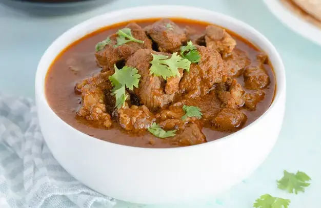 Order Lamb Curry food online from Bawarchi store, Wilmington on bringmethat.com