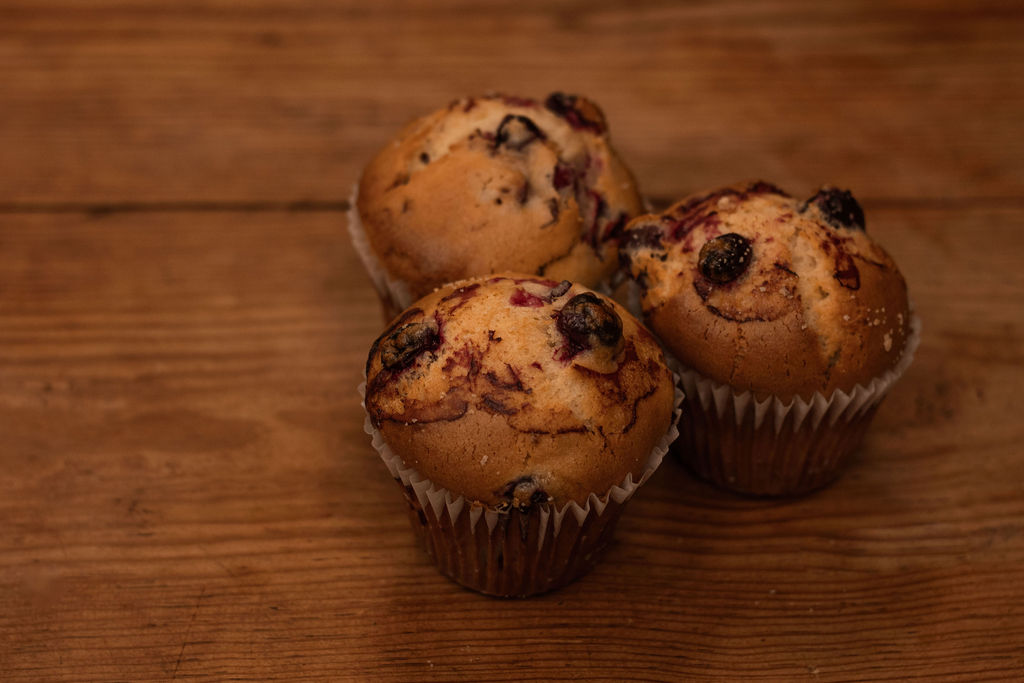 Order Cranberry Muffin food online from New World Bakery store, Kyle on bringmethat.com