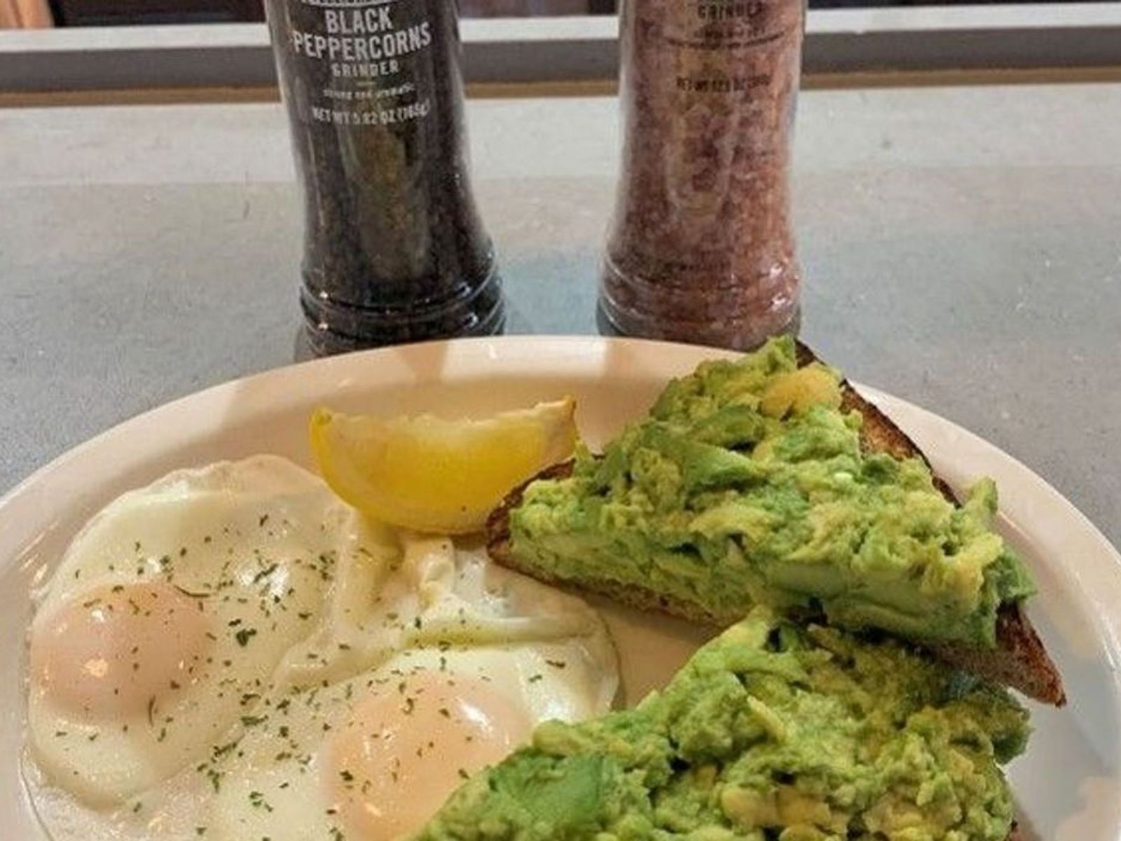 Order Avocado Toast - OO food online from Biscuits Cafe store, Chandler on bringmethat.com