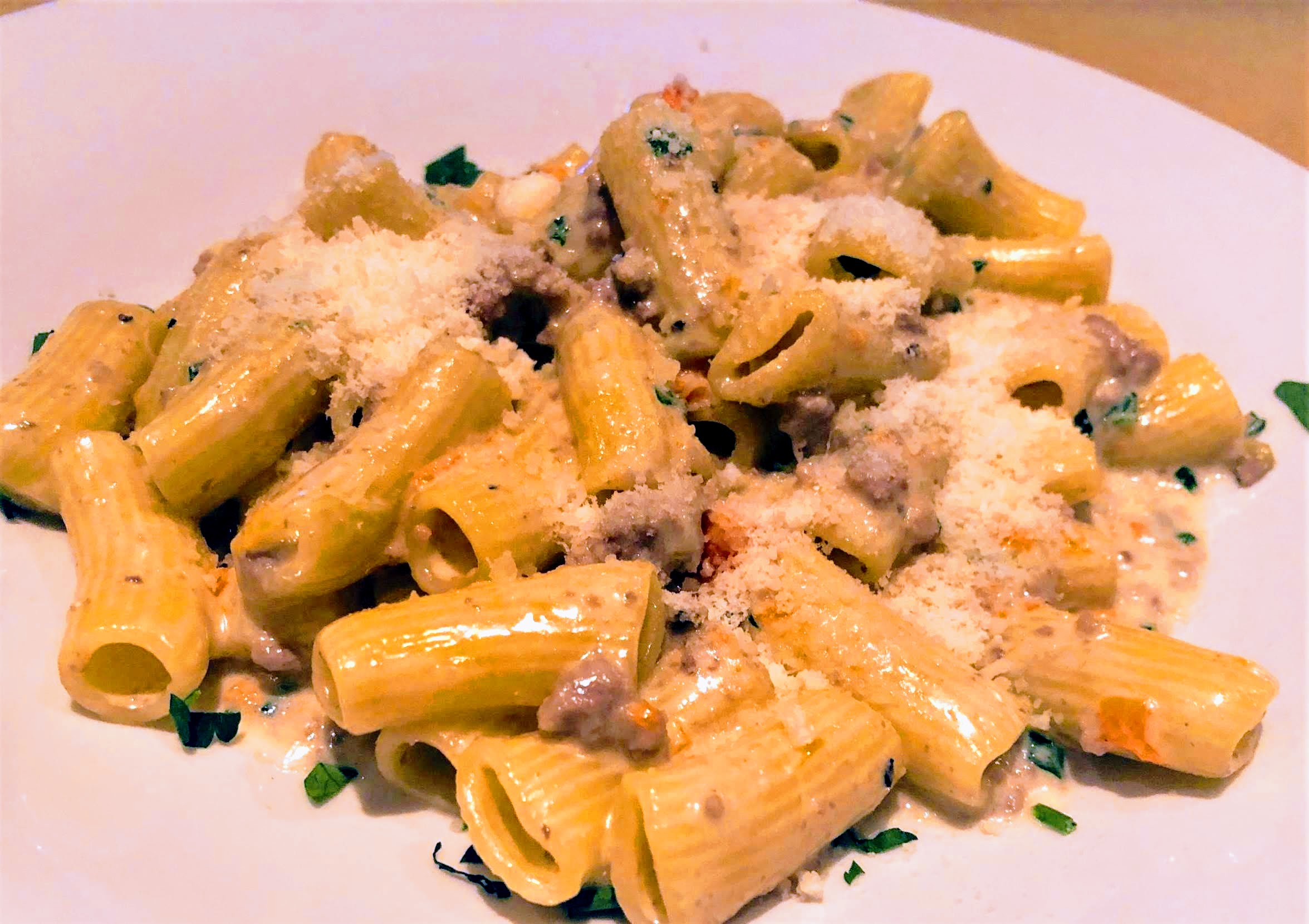 Order Rigatoni with sausage in a creamy truffle sauce food online from Giano restaurant store, New York on bringmethat.com